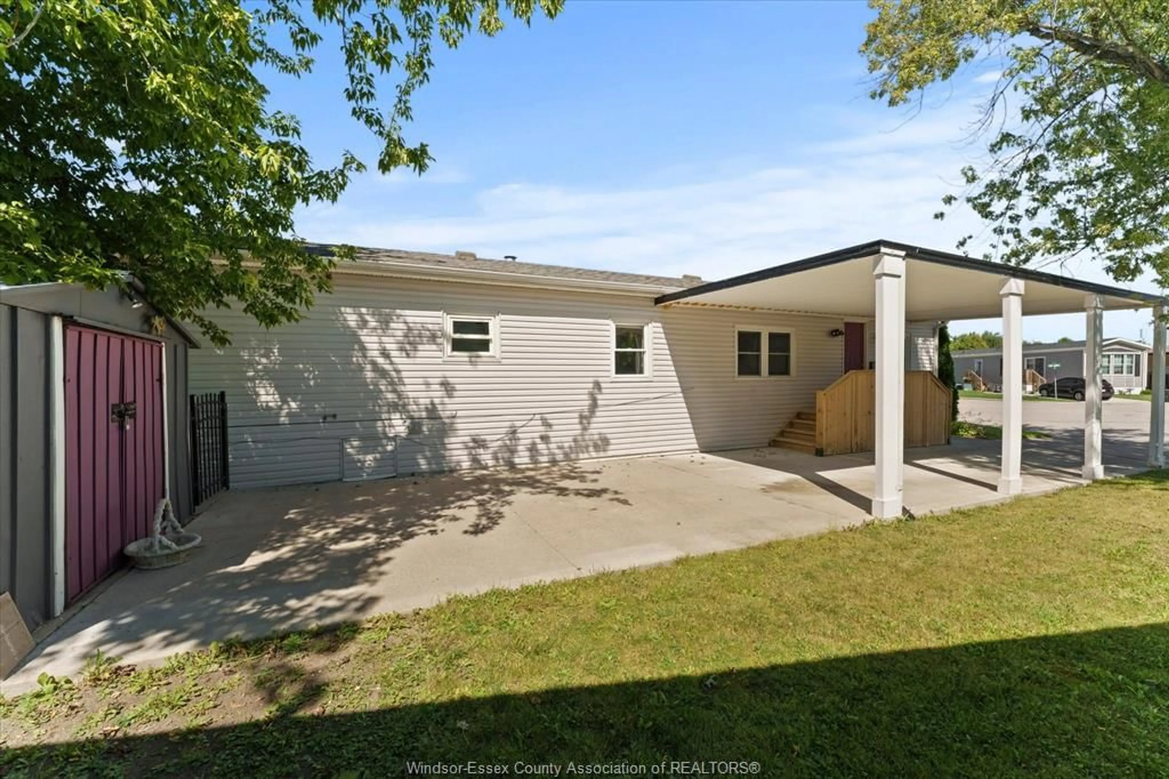 A pic from outside/outdoor area/front of a property/back of a property/a pic from drone, street for 52 PARKSIDE Dr, McGregor Ontario N0R 1J0