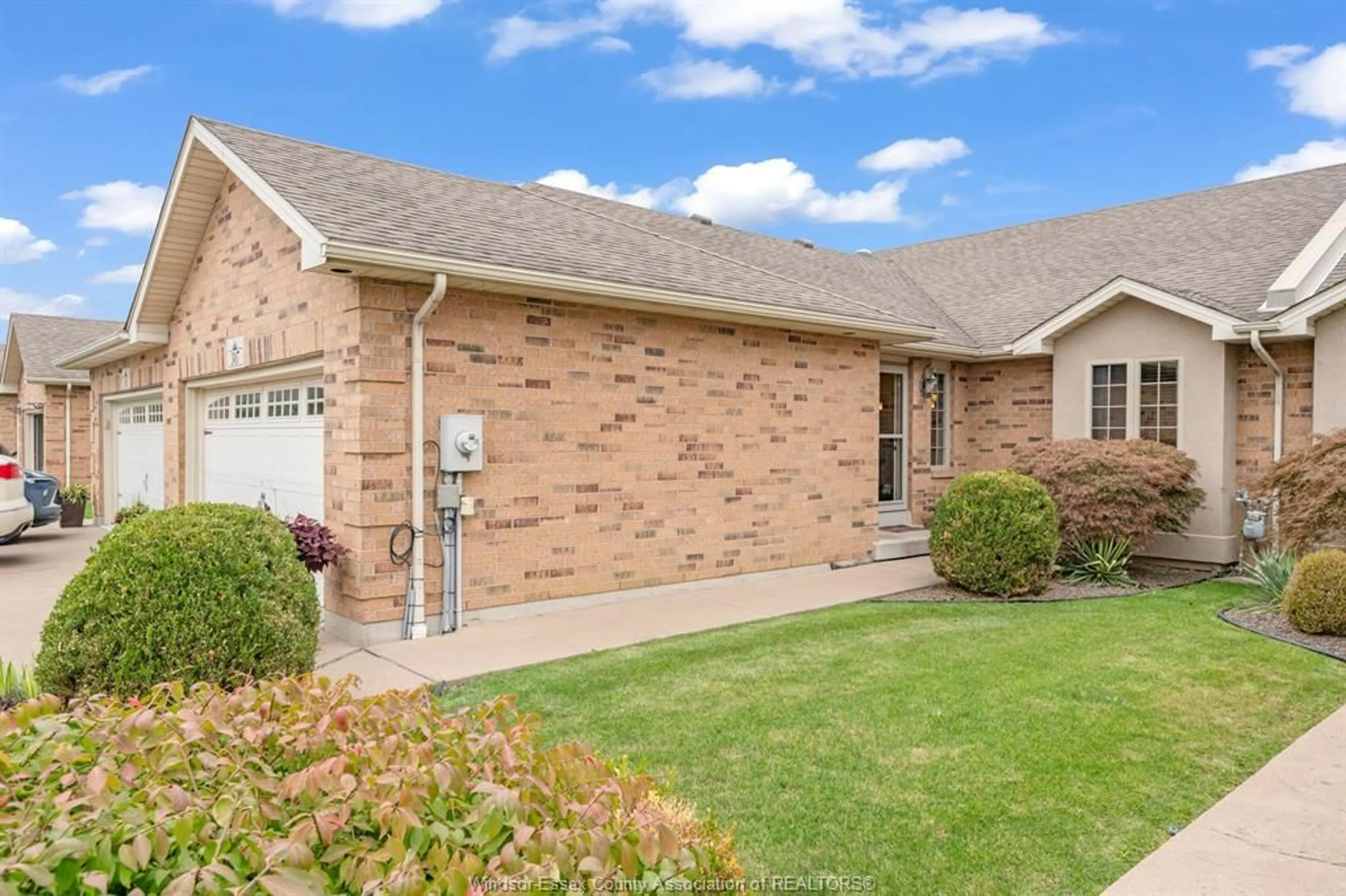 Home with brick exterior material, street for 307 GOLFVIEW Dr, Amherstburg Ontario N9V 0A1