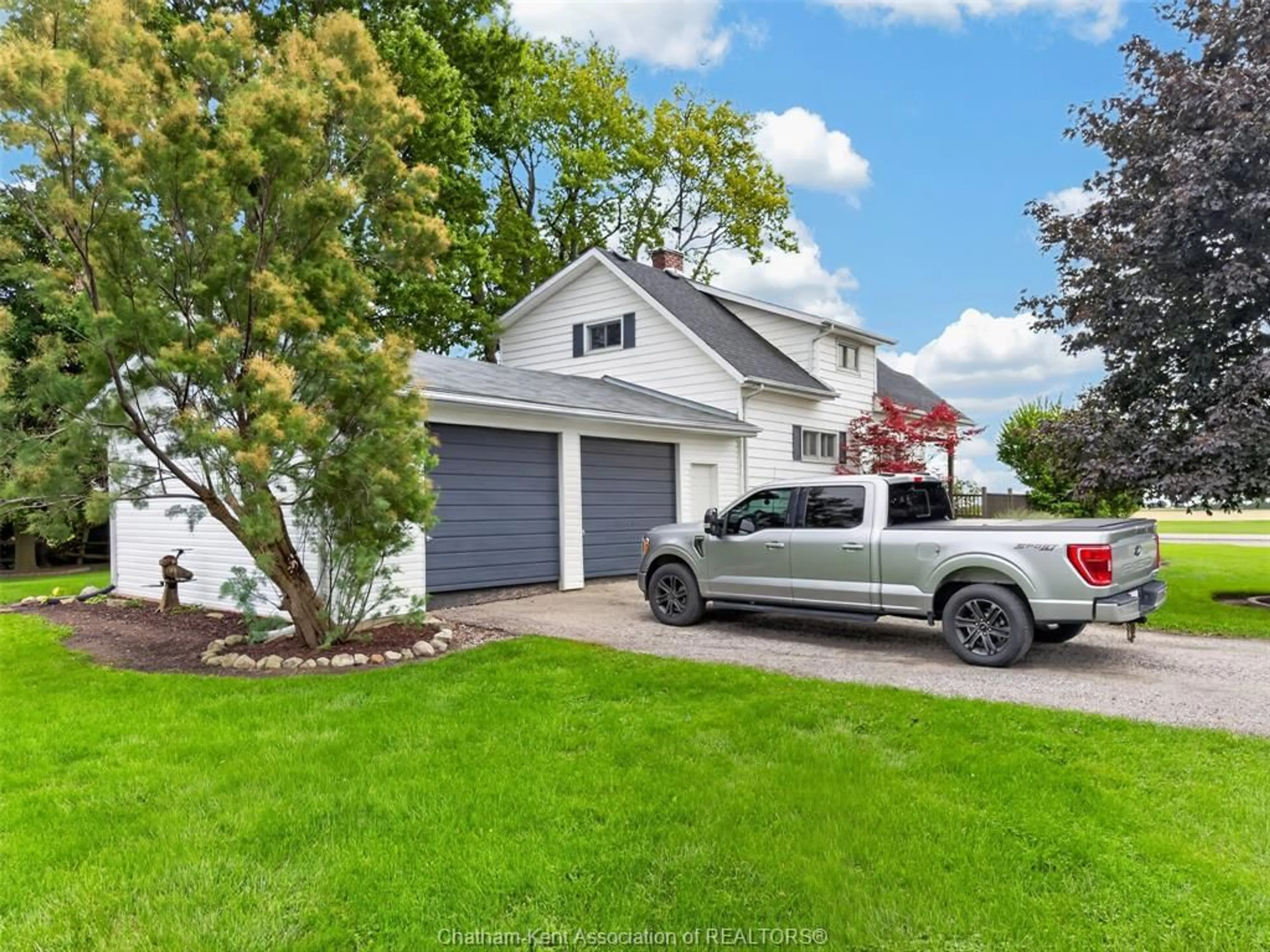 Home with vinyl exterior material, street for 7703 Base Line, Wallaceburg Ontario N8A 4L3