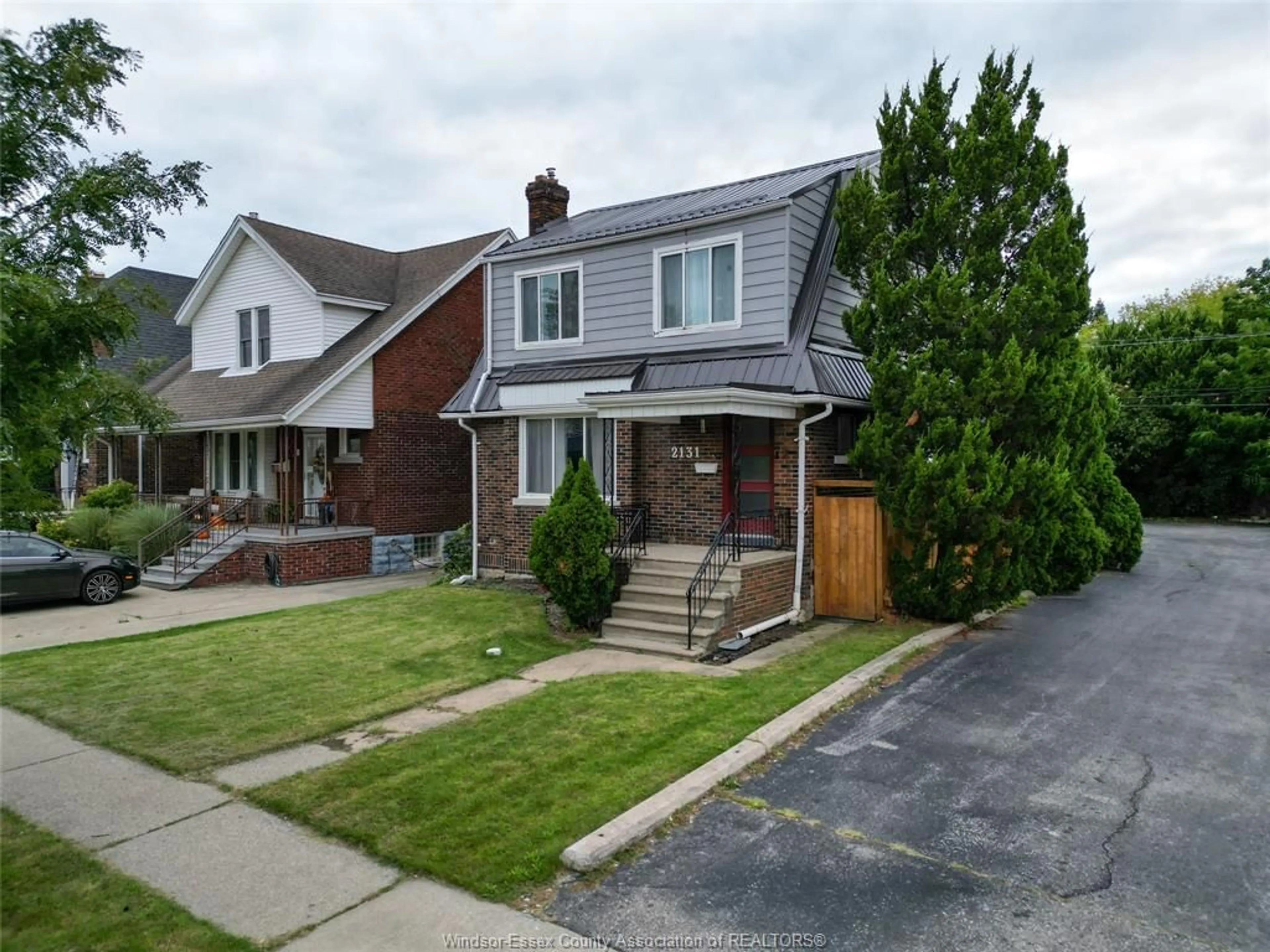Home with brick exterior material, street for 2131 LINCOLN Rd, Windsor Ontario N8W 2P9