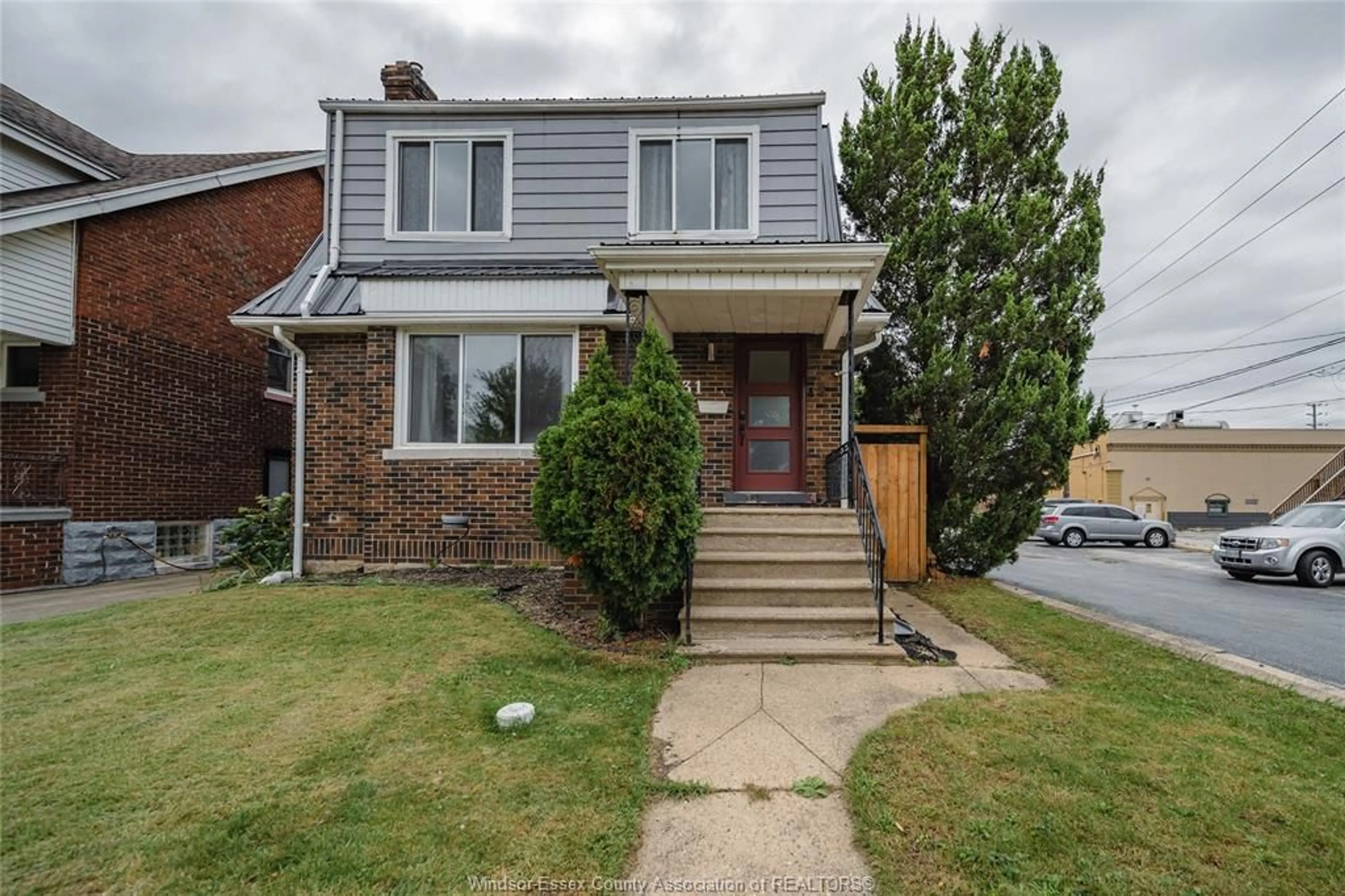 Home with brick exterior material, street for 2131 LINCOLN Rd, Windsor Ontario N8W 2P9
