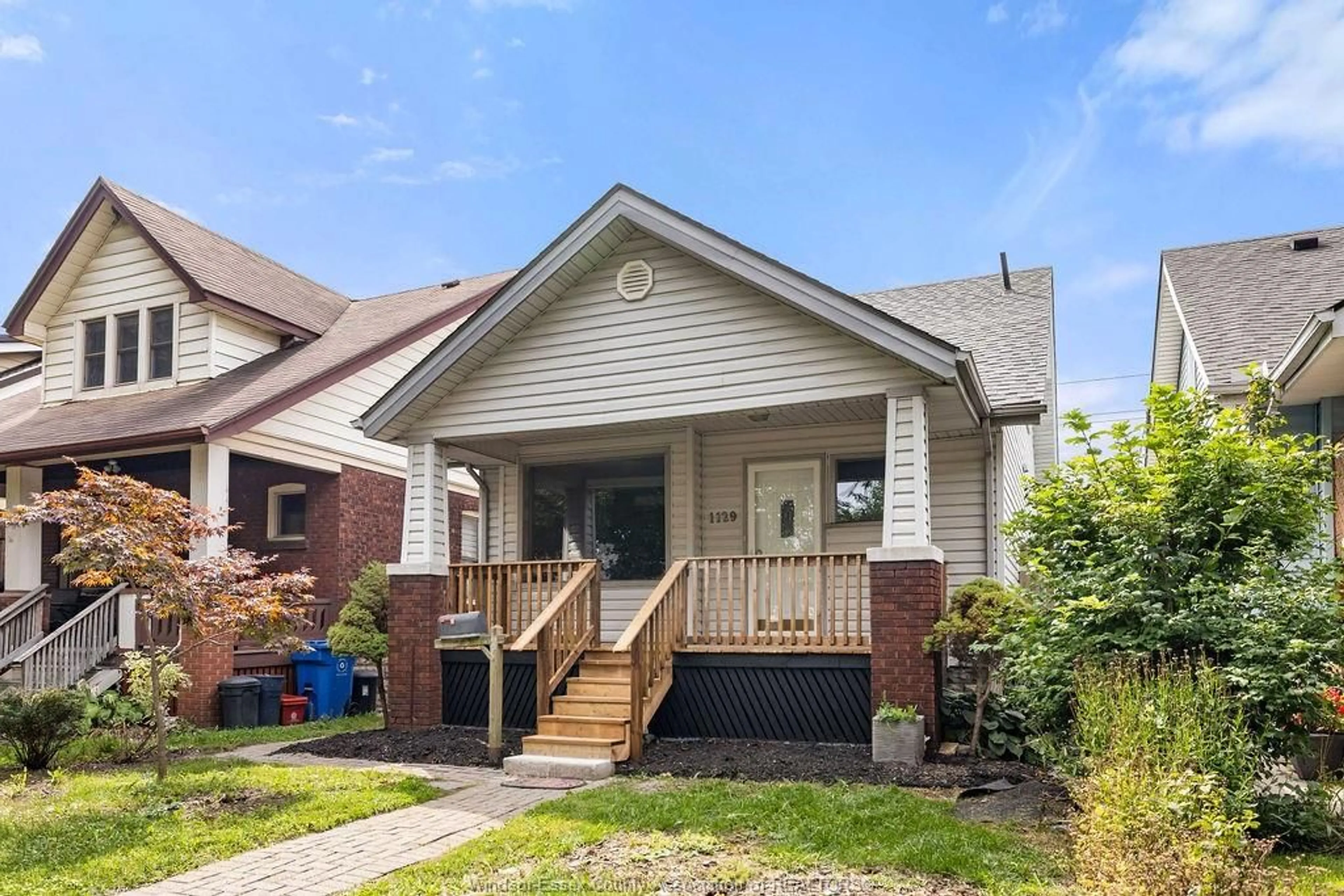 Home with brick exterior material, street for 1129 JANETTE Ave, Windsor Ontario N9A 5A6