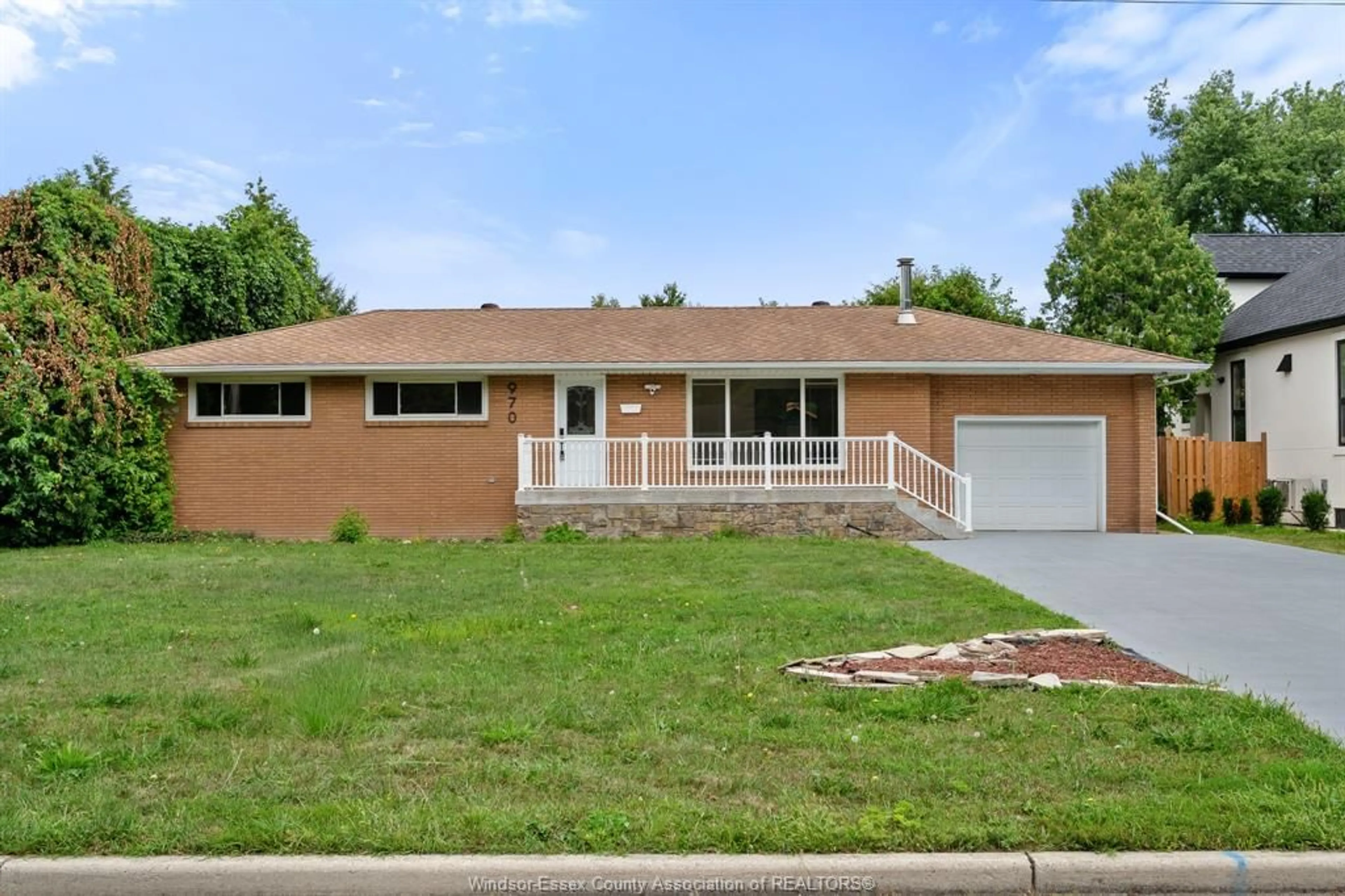 Home with brick exterior material, street for 970 Morand St, Windsor Ontario N9G 1J4