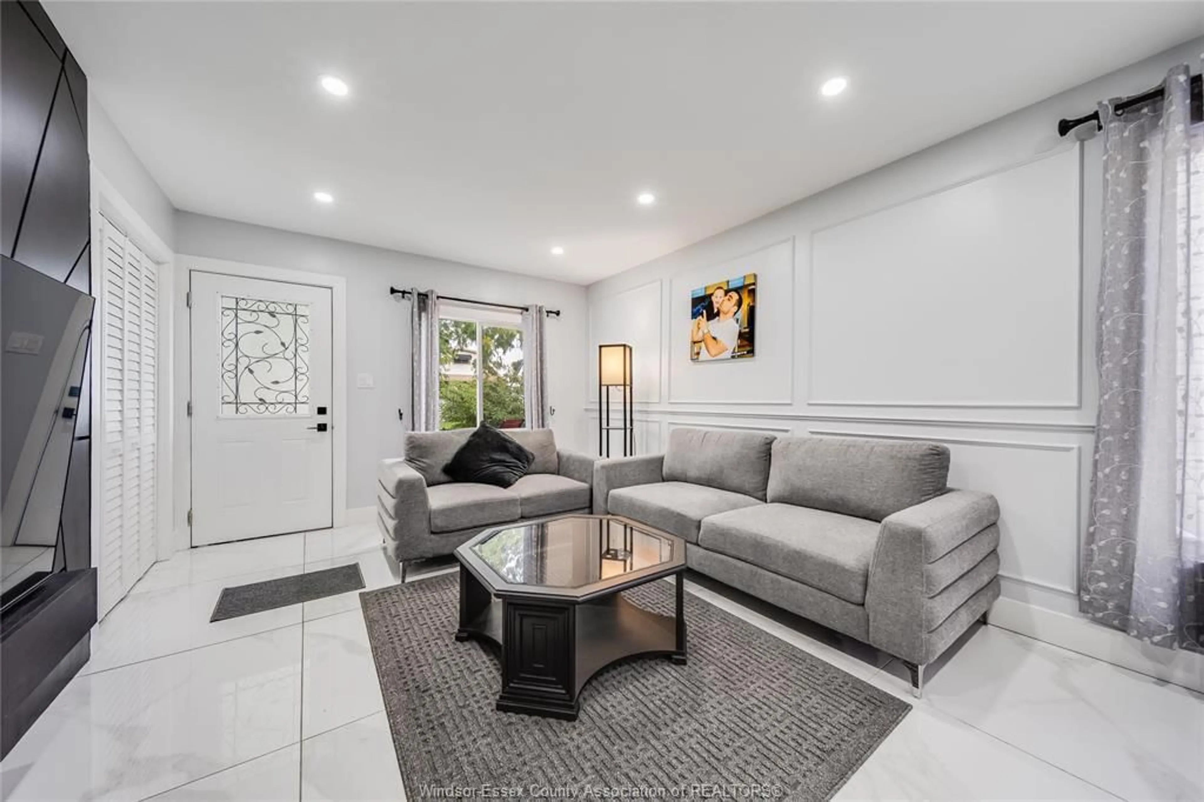 Living room with furniture, ceramic/tile floor for 629 STANLEY St, Windsor Ontario N8X 3B3