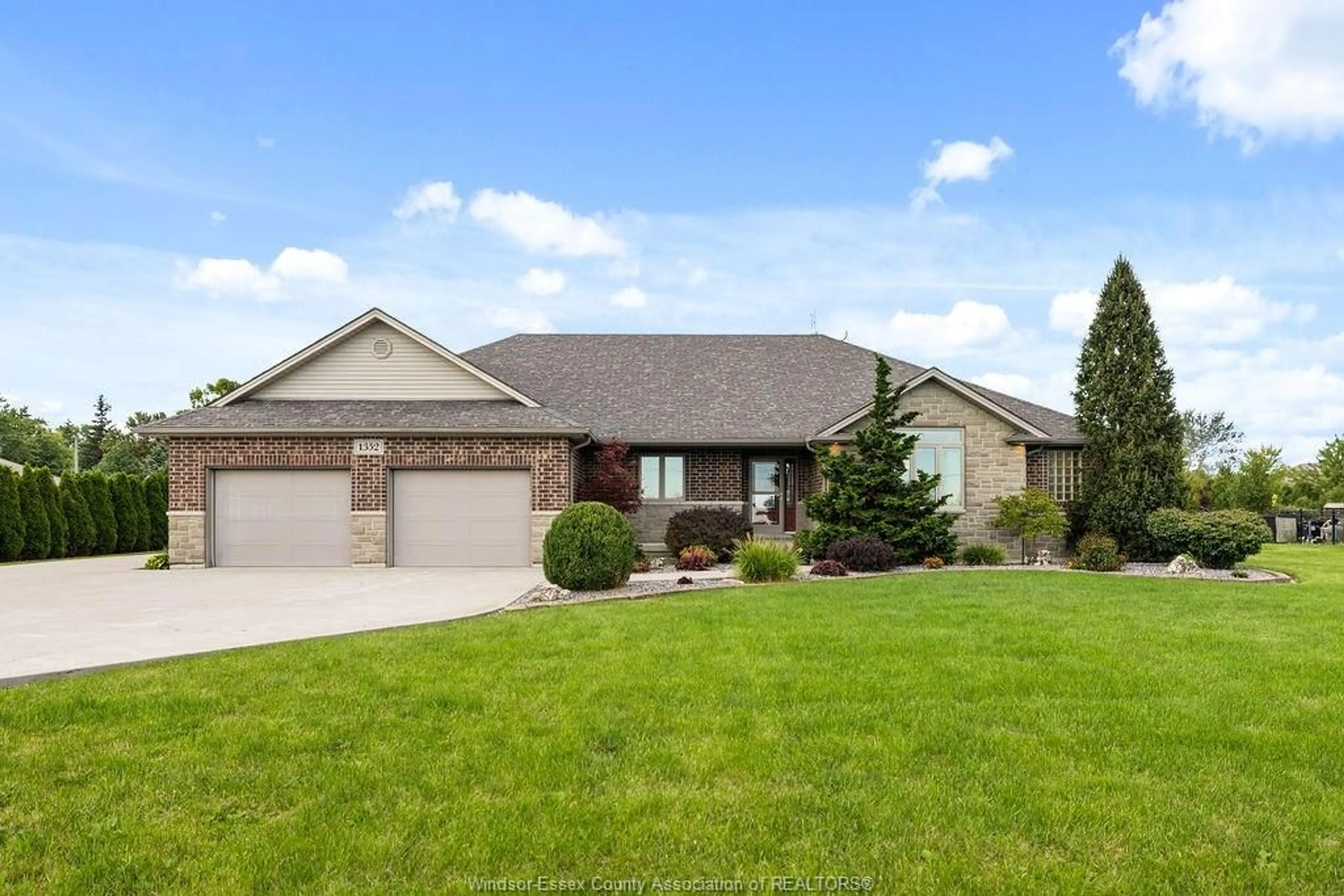 Home with brick exterior material, unknown for 1352 Tecumseh Rd, Lakeshore Ontario N0R 1N0