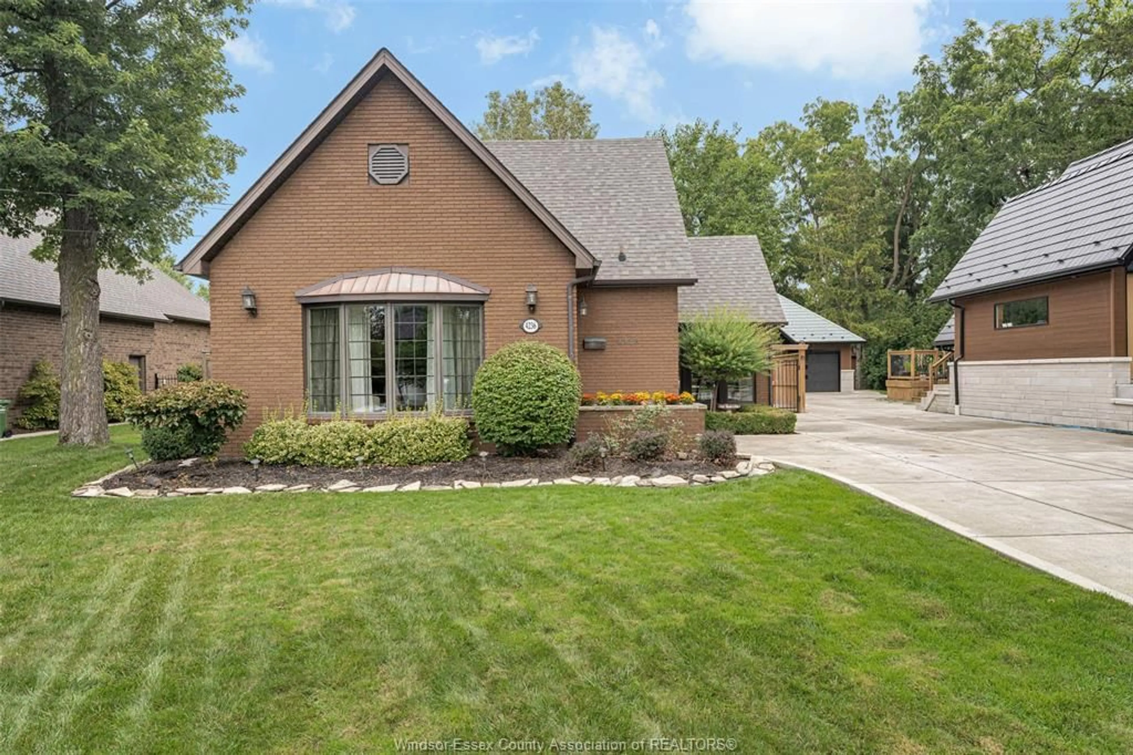 Home with brick exterior material, street for 4236 ROSELAND Dr, Windsor Ontario N9G 1Y7
