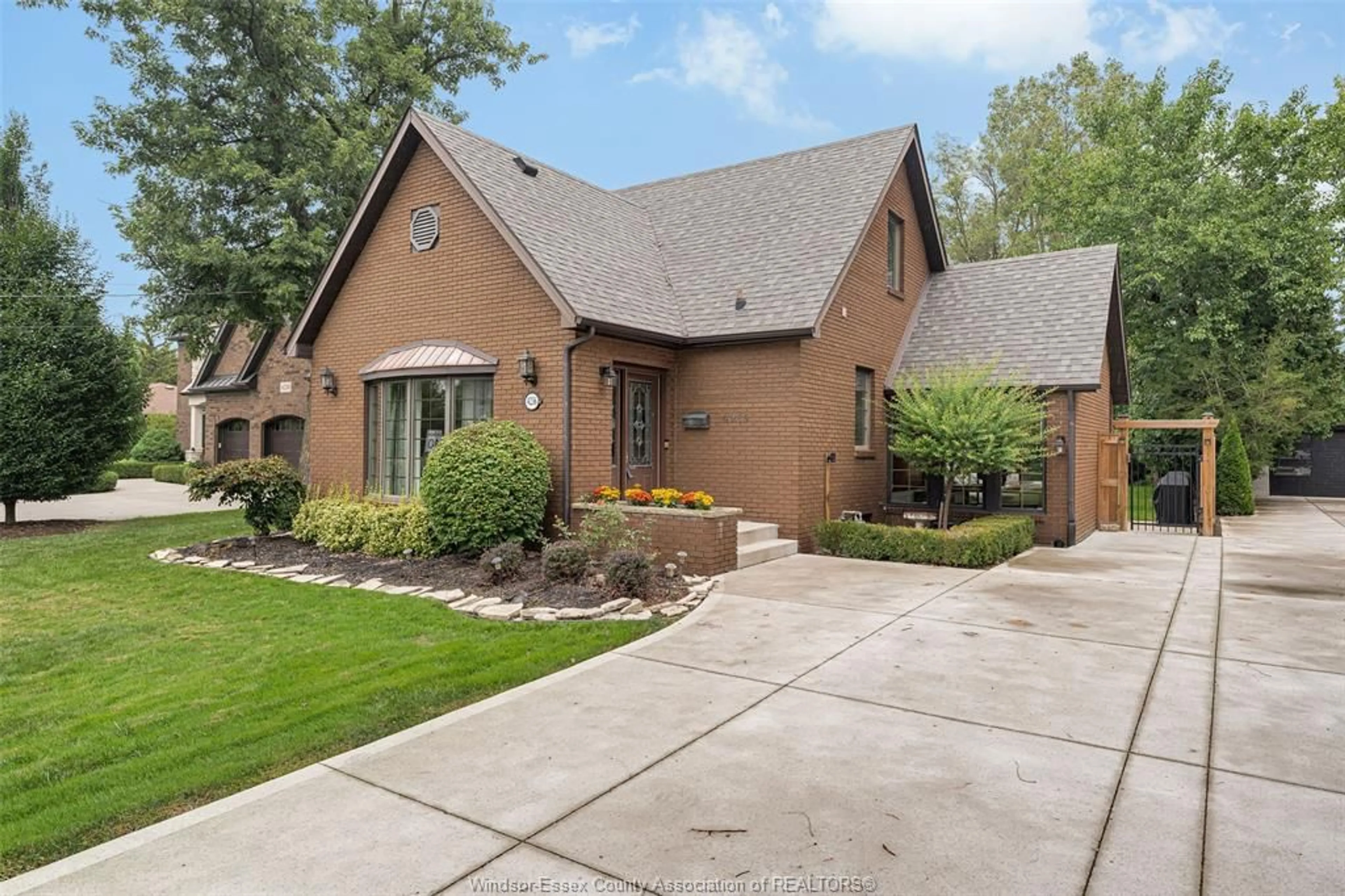 Home with brick exterior material, street for 4236 ROSELAND Dr, Windsor Ontario N9G 1Y7