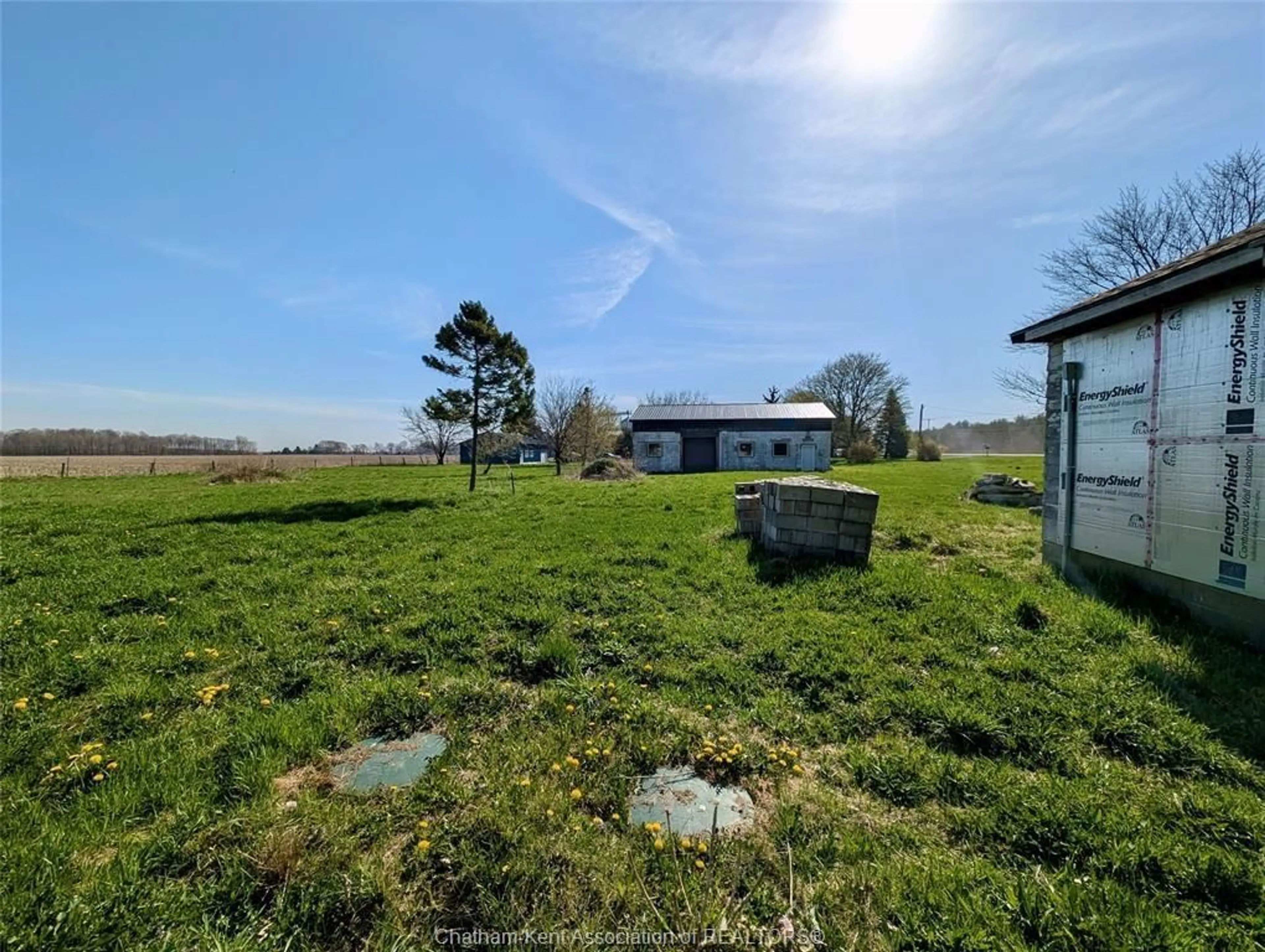 A pic from outside/outdoor area/front of a property/back of a property/a pic from drone, water/lake/river/ocean view for 12003 Base Line Rd, Thamesville Ontario N0P 2K0