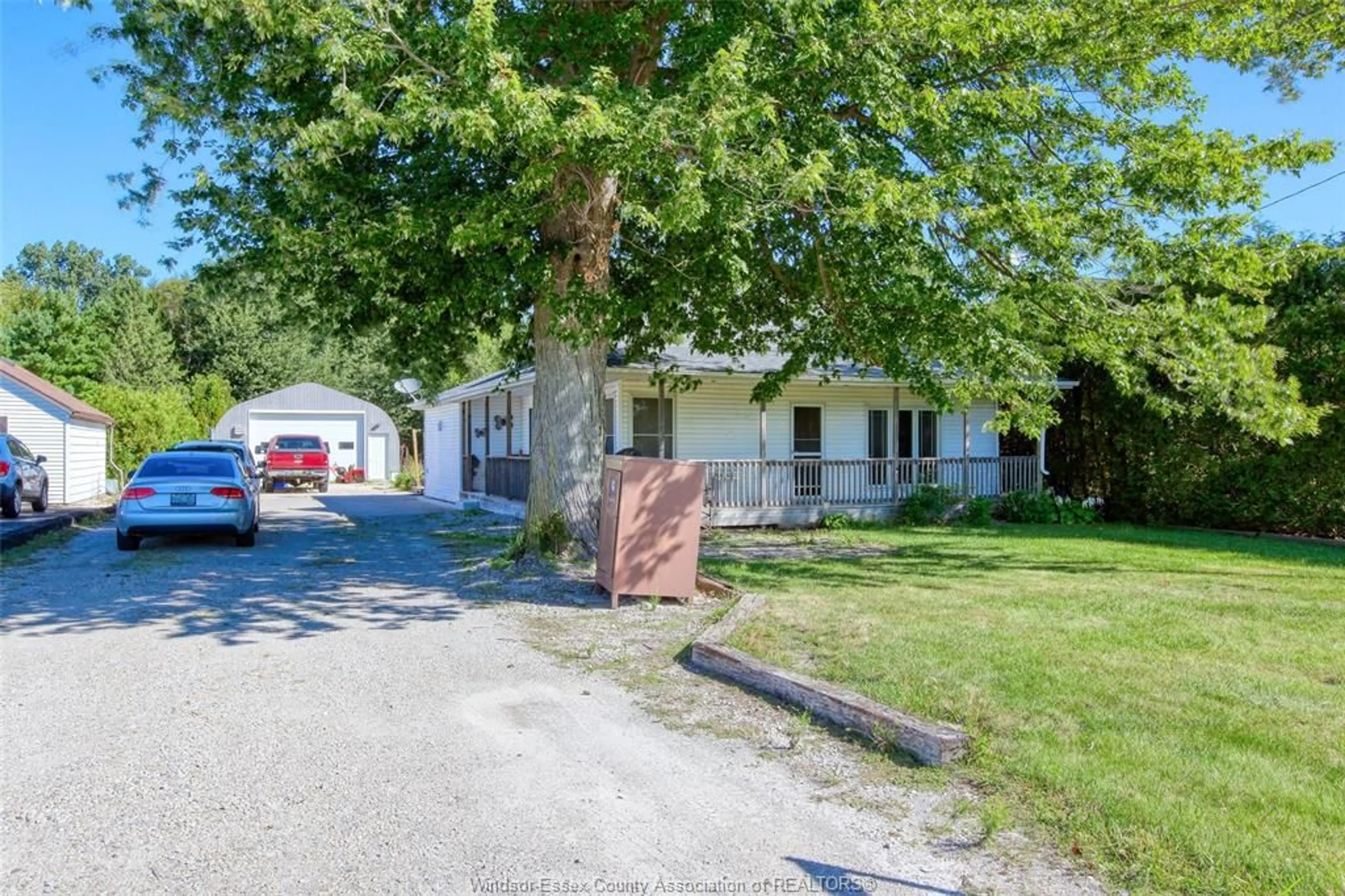 A pic from outside/outdoor area/front of a property/back of a property/a pic from drone, street for 1323 MERSEA RD 2, Leamington Ontario N8H 3V7