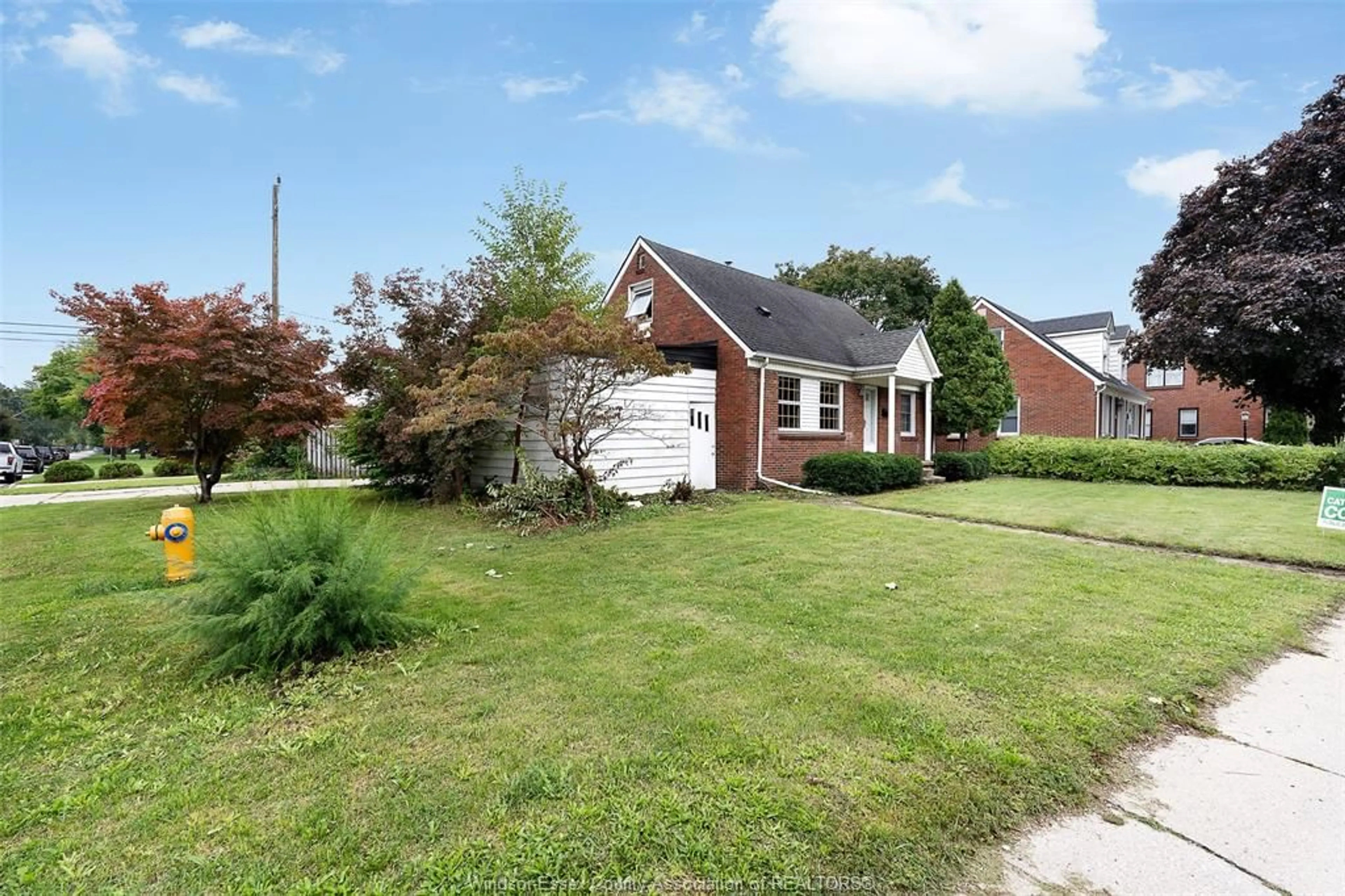 A pic from outside/outdoor area/front of a property/back of a property/a pic from drone, street for 7275 WYANDOTTE, Windsor Ontario N8S 1R5