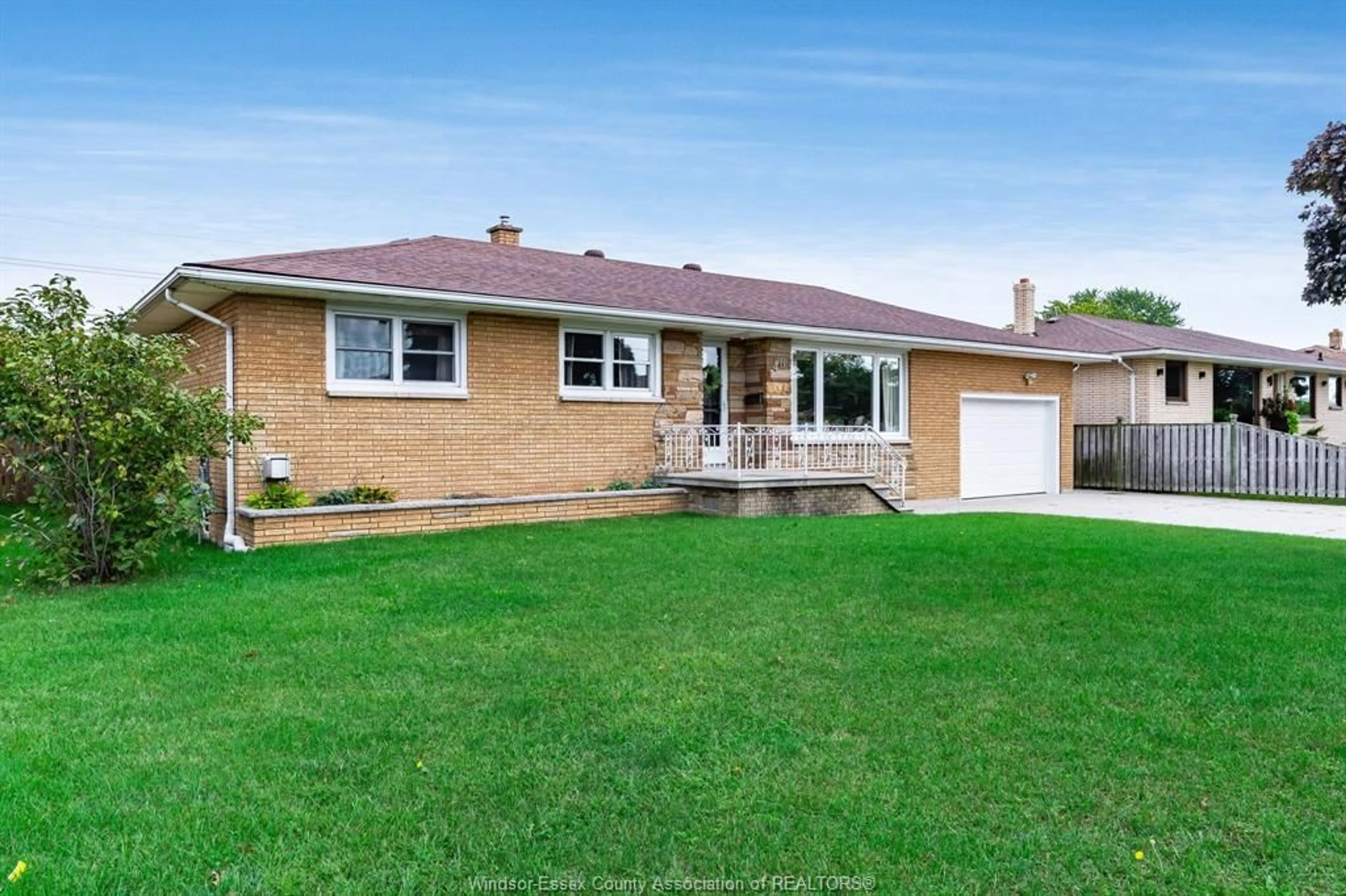 Home with brick exterior material, street for 40 NICHOLAS St, Leamington Ontario N8H 3R9