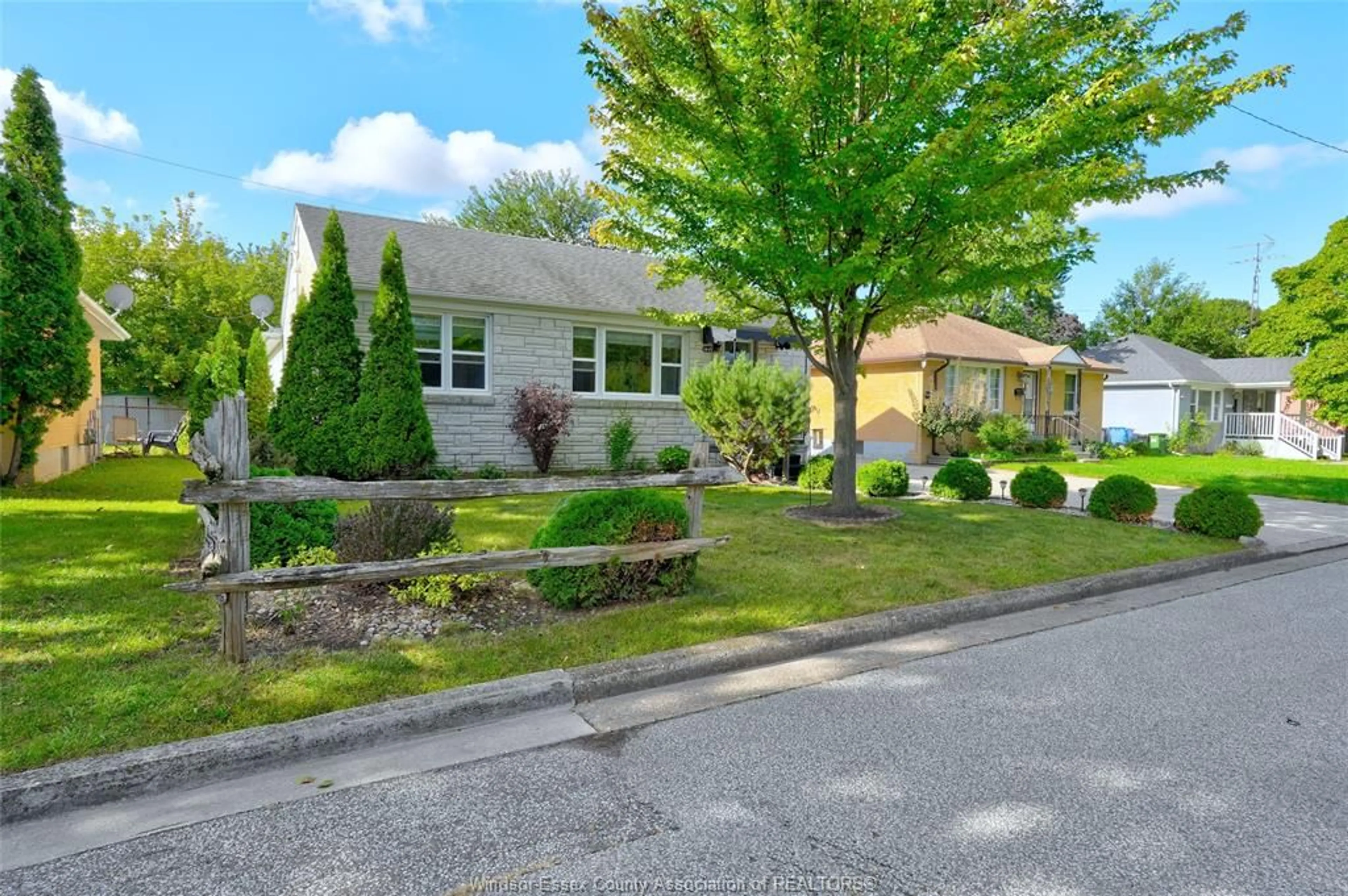 Home with vinyl exterior material, street for 1449 REDWOOD Ave, Windsor Ontario N9C 3P2