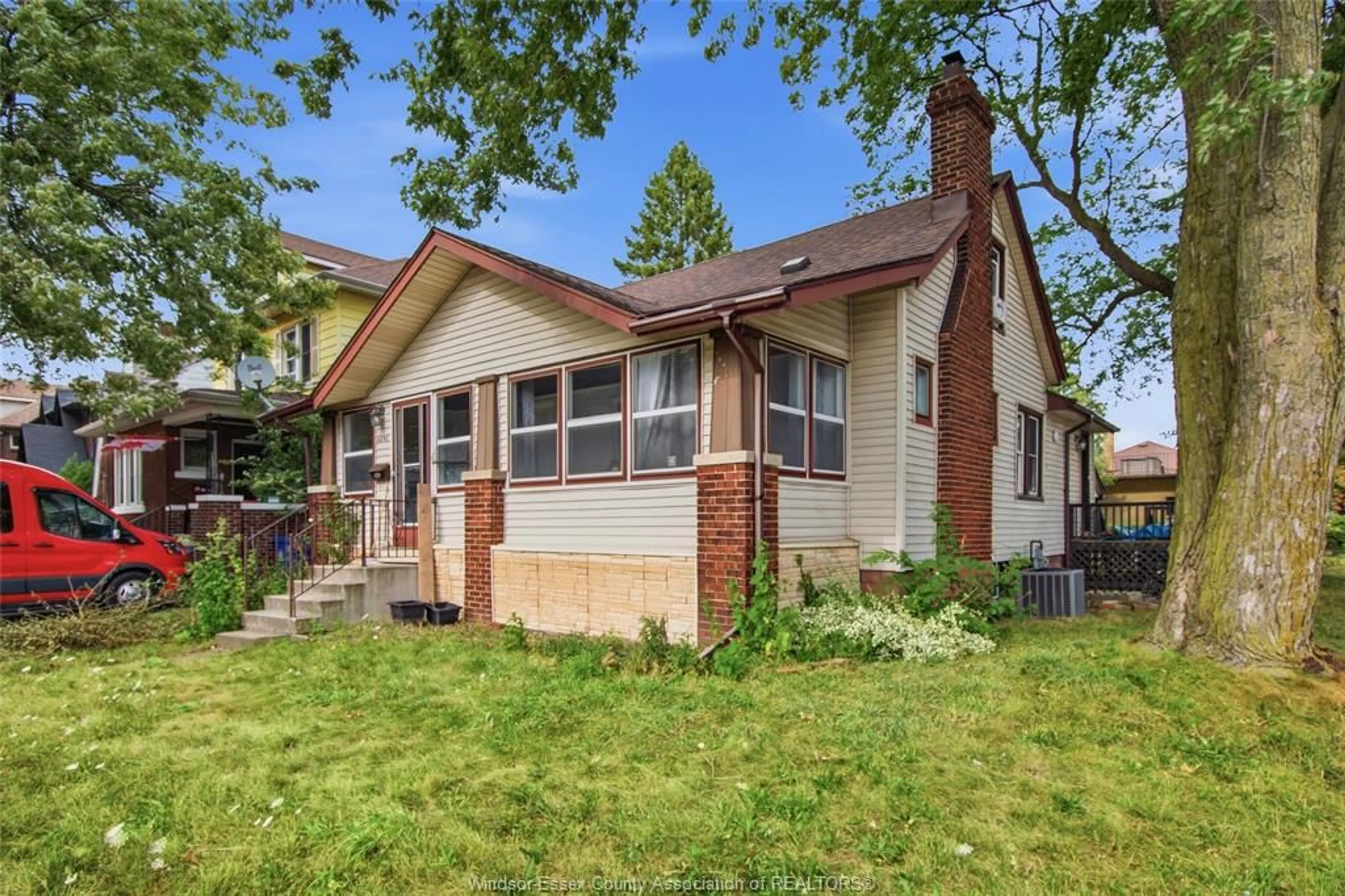 Home with vinyl exterior material, street for 2292 DOUGALL Ave, Windsor Ontario N8X 1S8