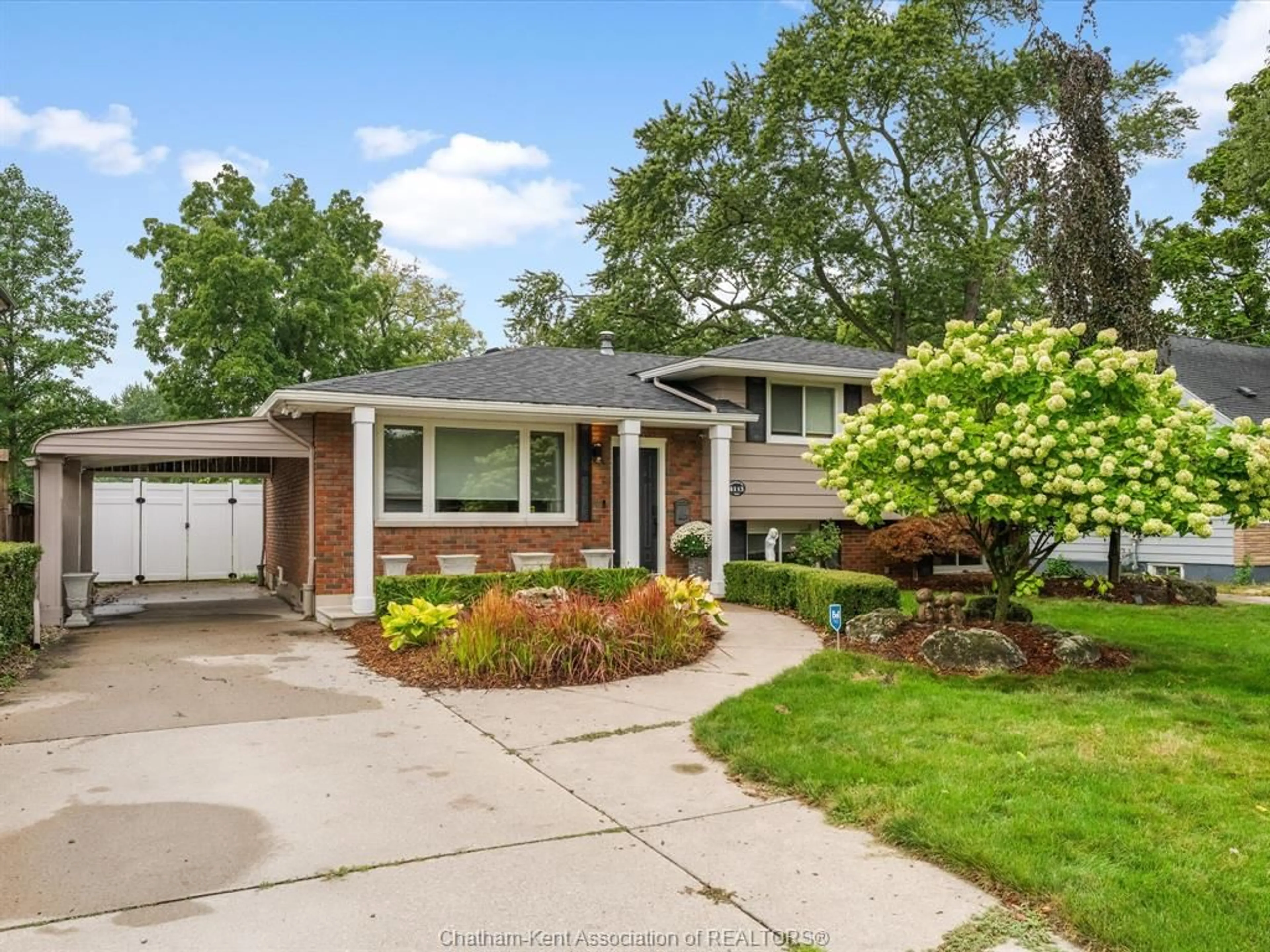 Home with brick exterior material, street for 4113 Roseland Dr, Windsor Ontario N9G 1Y5