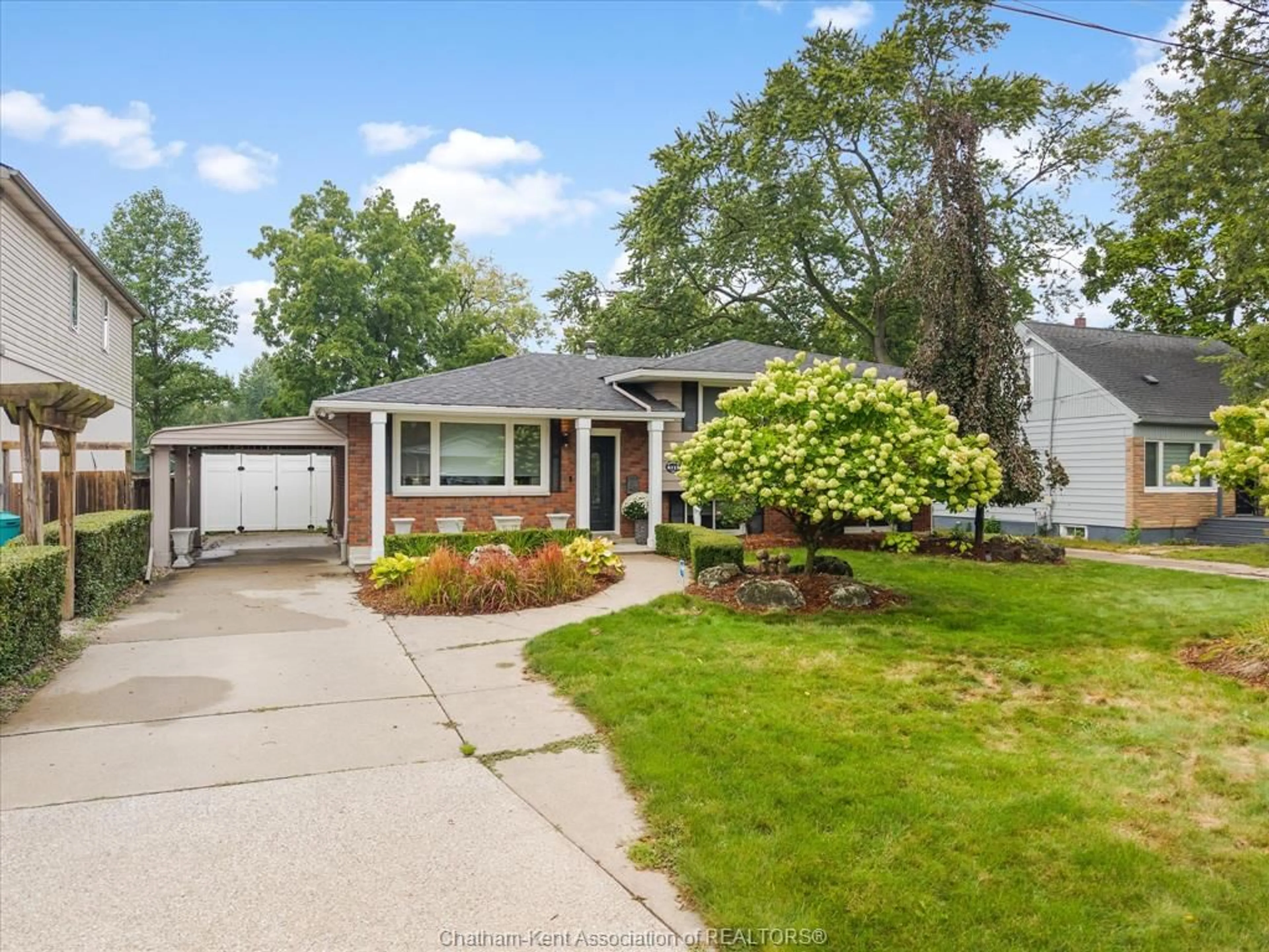 Home with vinyl exterior material, street for 4113 Roseland Dr, Windsor Ontario N9G 1Y5
