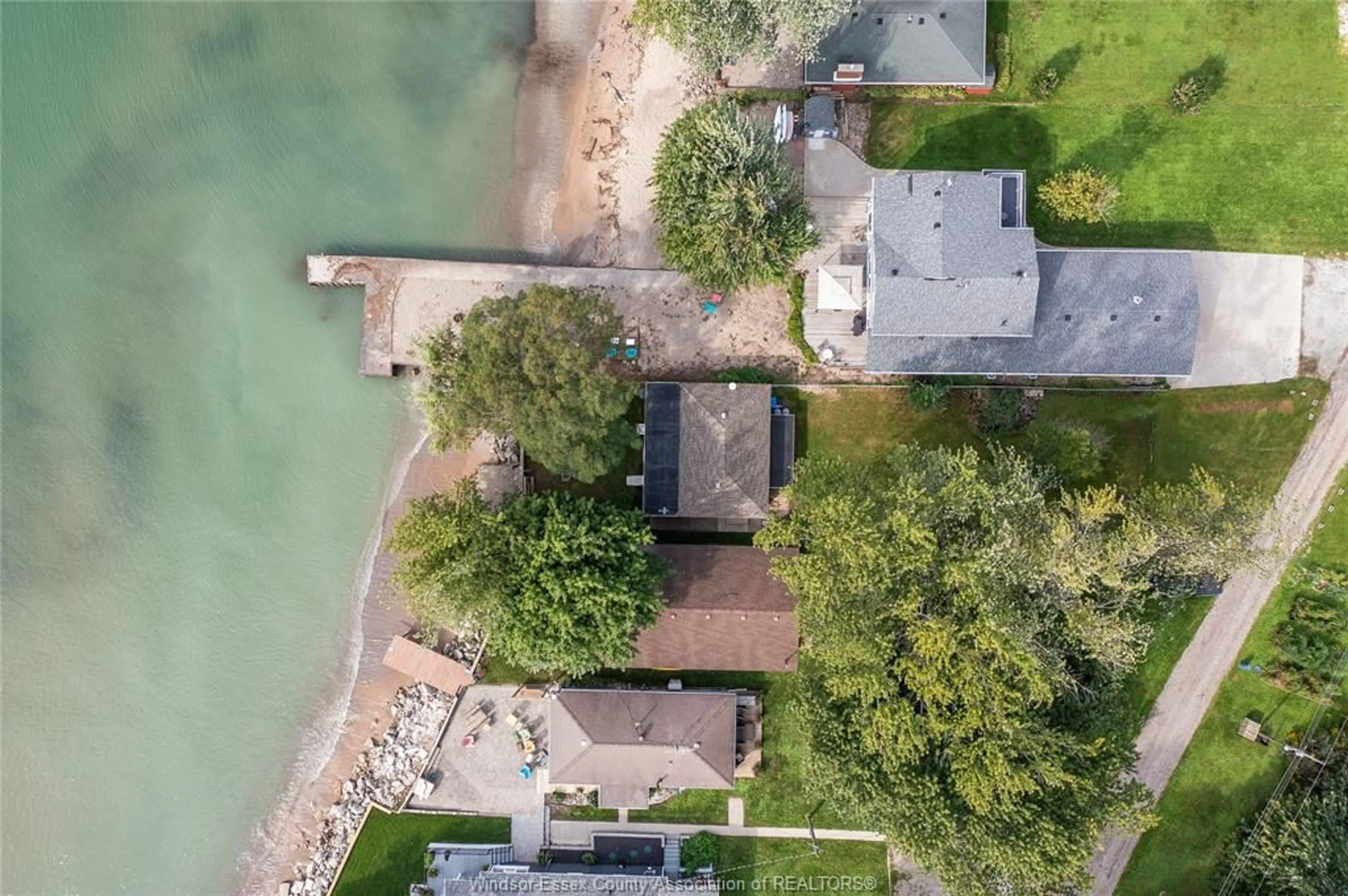 A pic from outside/outdoor area/front of a property/back of a property/a pic from drone, water/lake/river/ocean view for 845 ERIE BLUE, Essex Ontario N0R 1G0