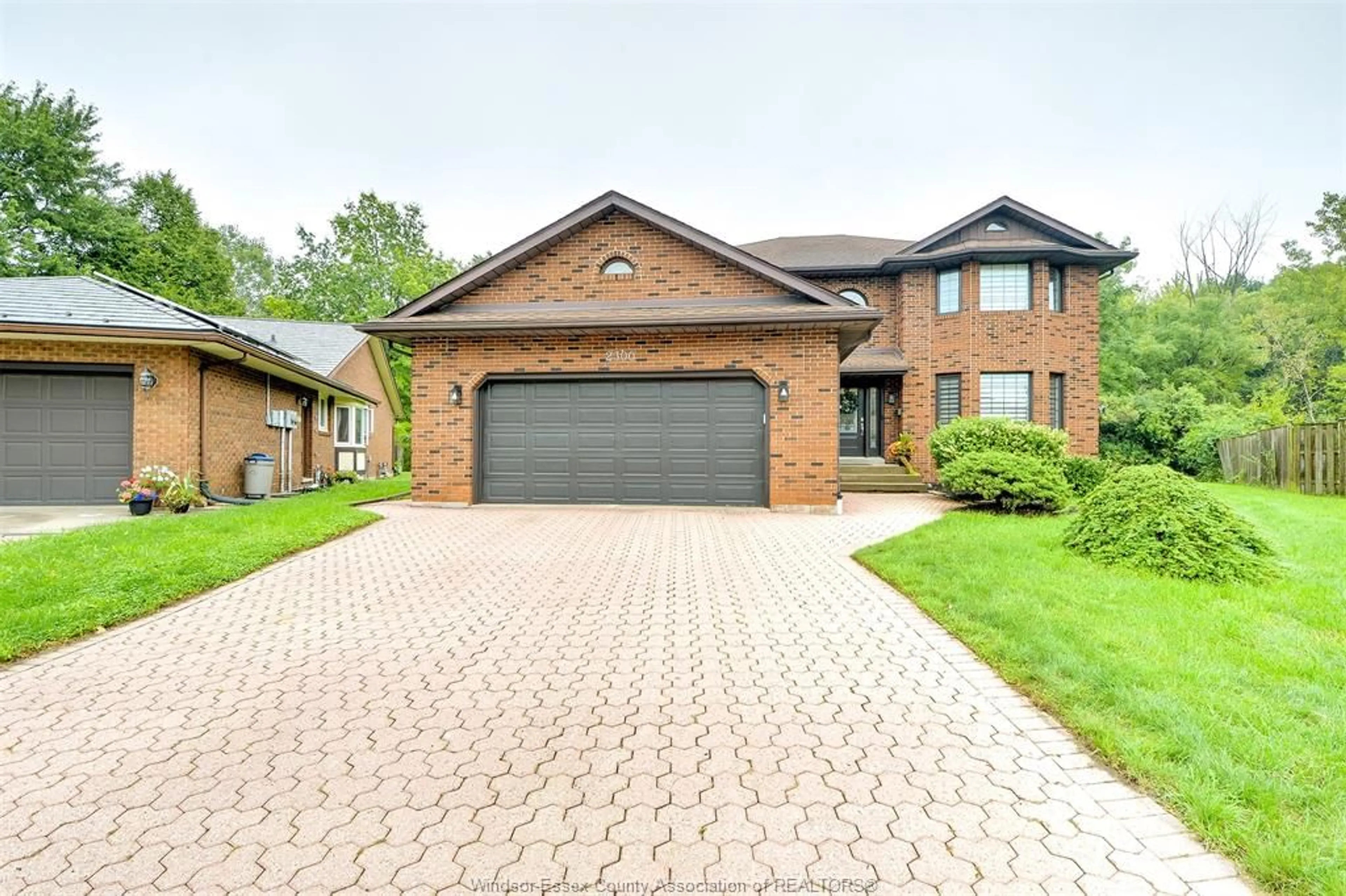 Home with brick exterior material, street for 2300 Santo Dr, Windsor Ontario N9G 2J8