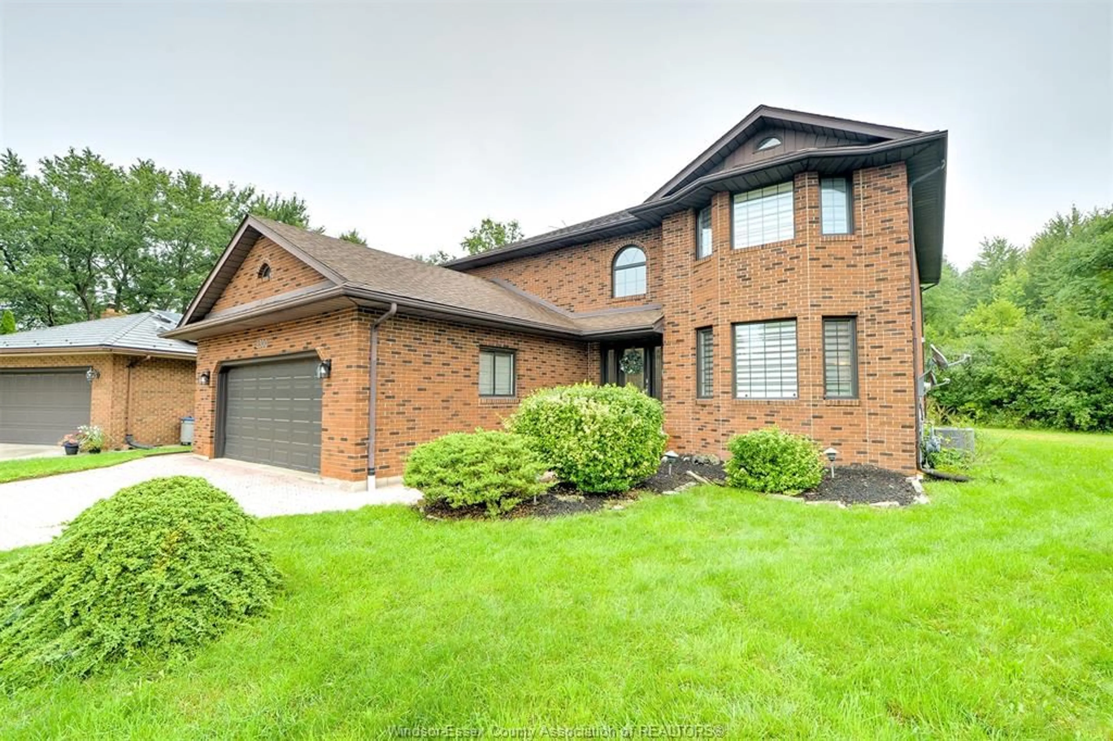 Home with brick exterior material, street for 2300 Santo Dr, Windsor Ontario N9G 2J8