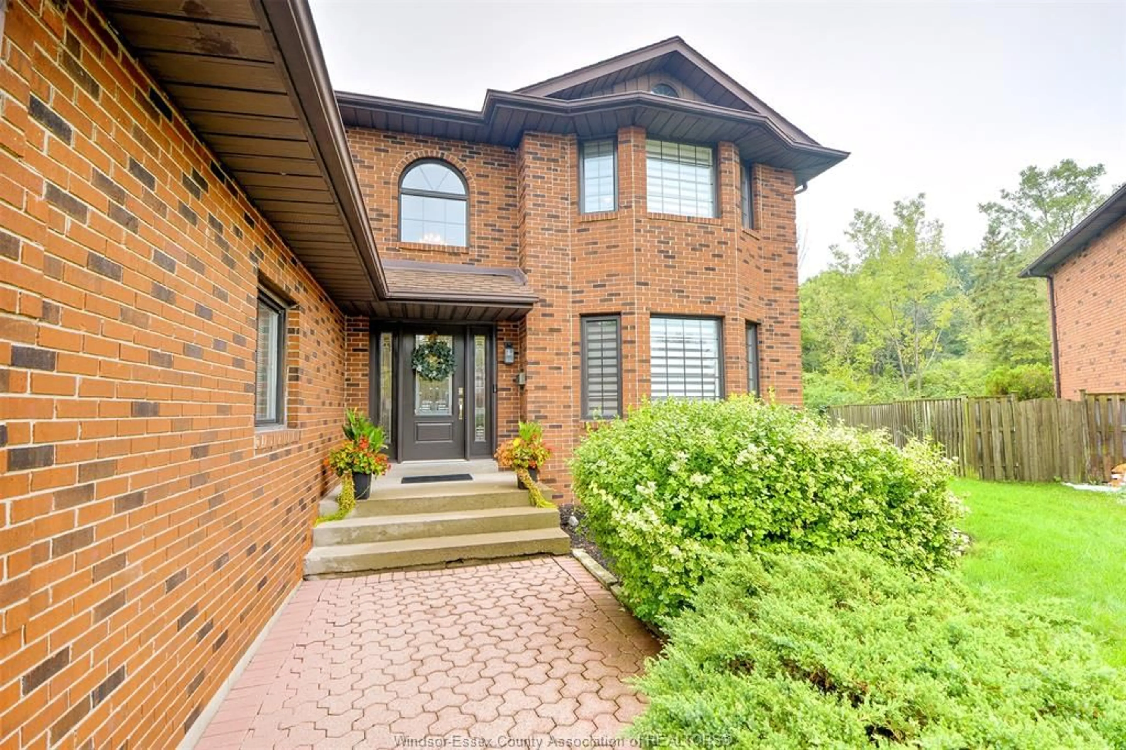 Home with brick exterior material, street for 2300 Santo Dr, Windsor Ontario N9G 2J8