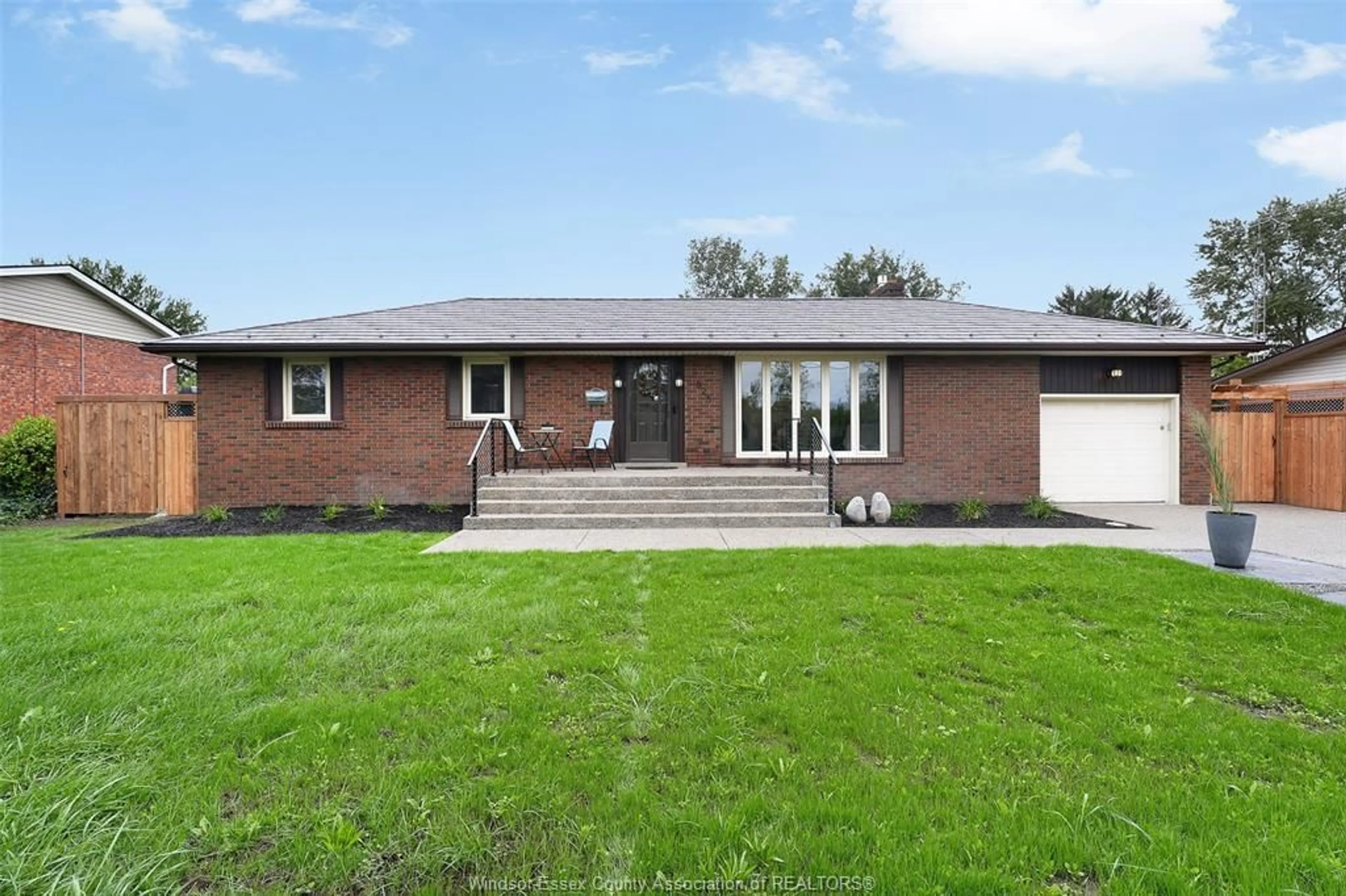 Home with brick exterior material, street for 825 MORTON Dr, LaSalle Ontario N9J 3V3
