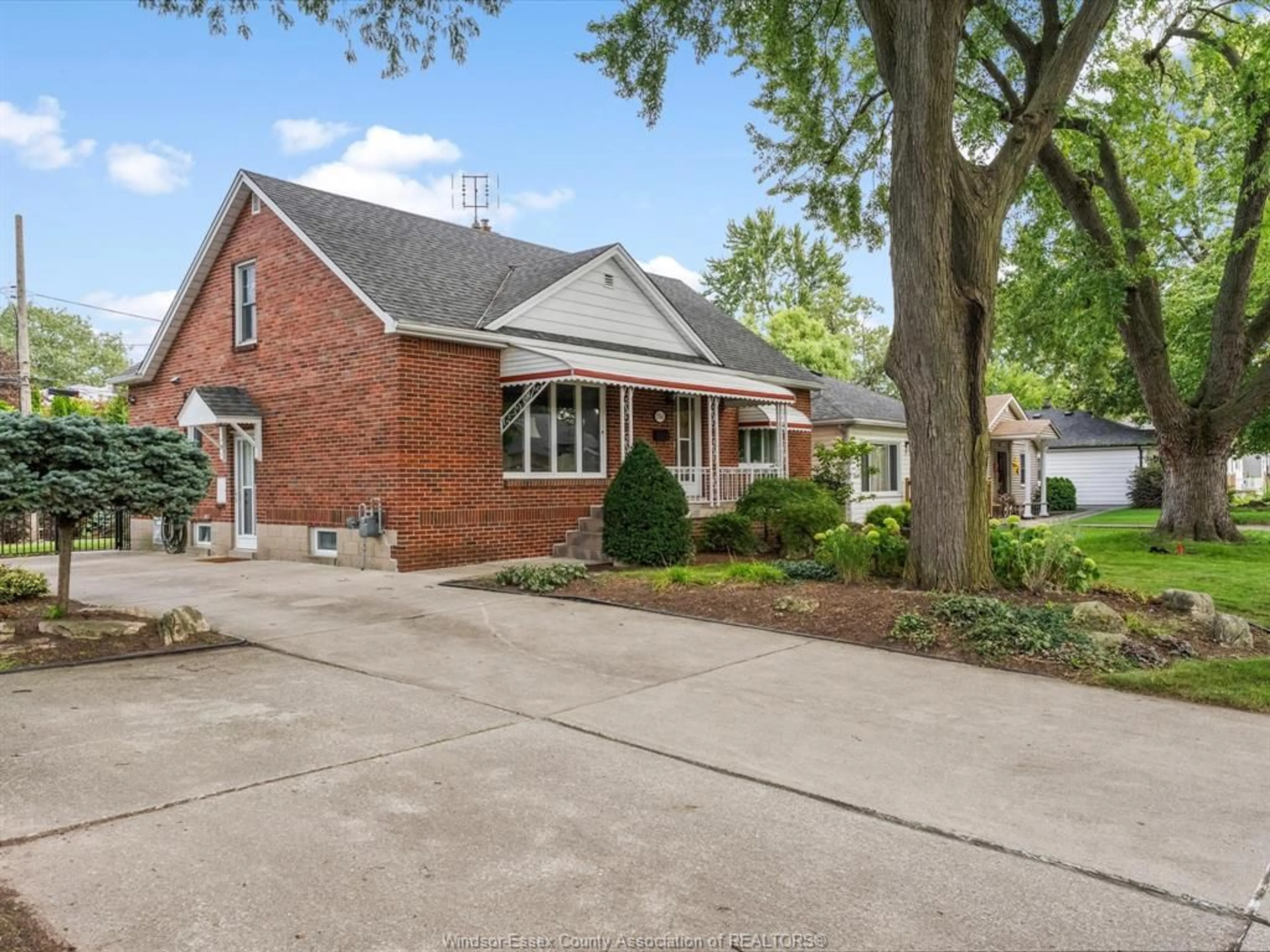 Home with brick exterior material, street for 2566 Tourangeau, Windsor Ontario N8W 4N9