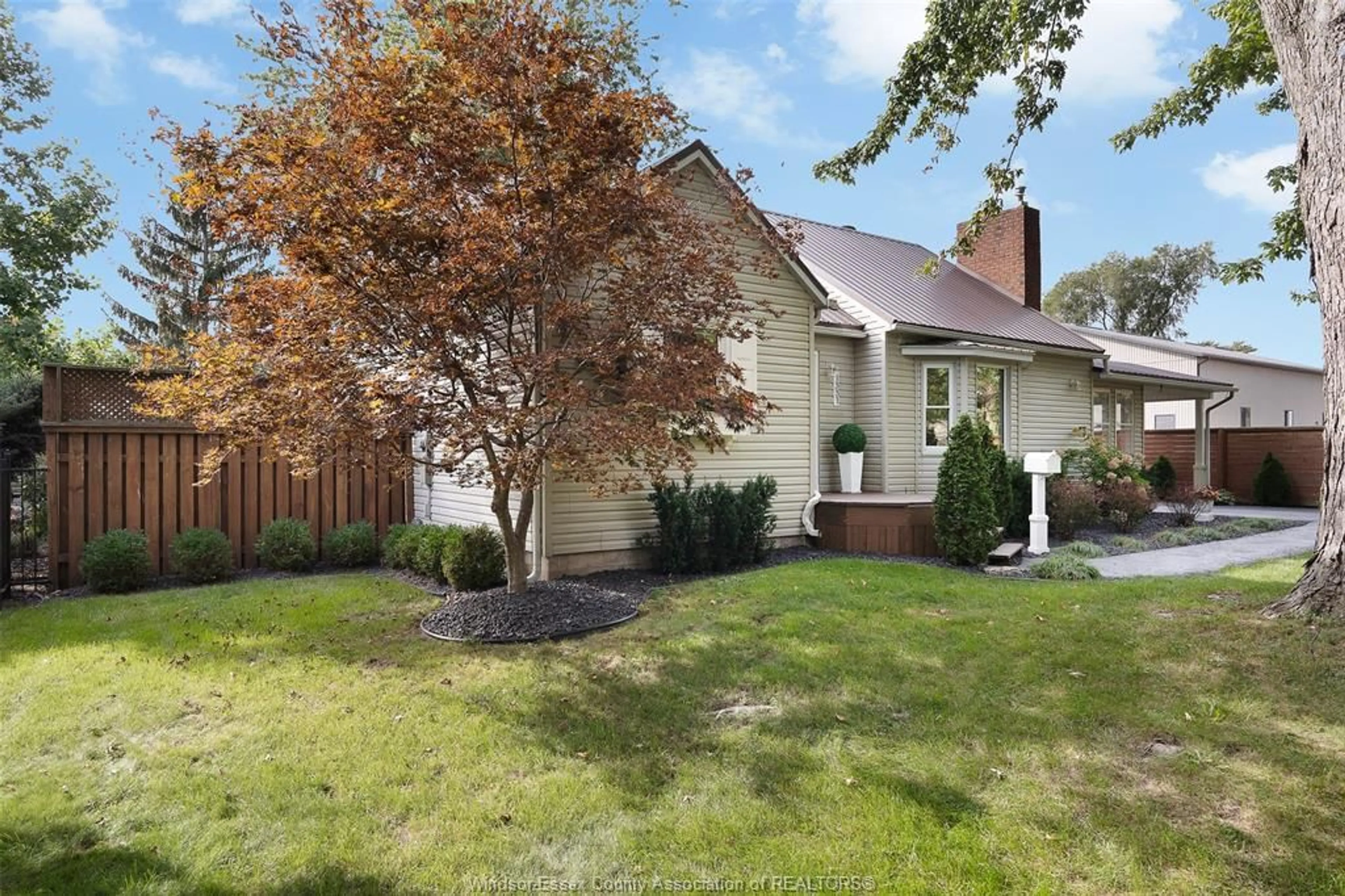 Home with brick exterior material, street for 1331 CLOVELLY Dr, Kingsville Ontario N9Y 2P3
