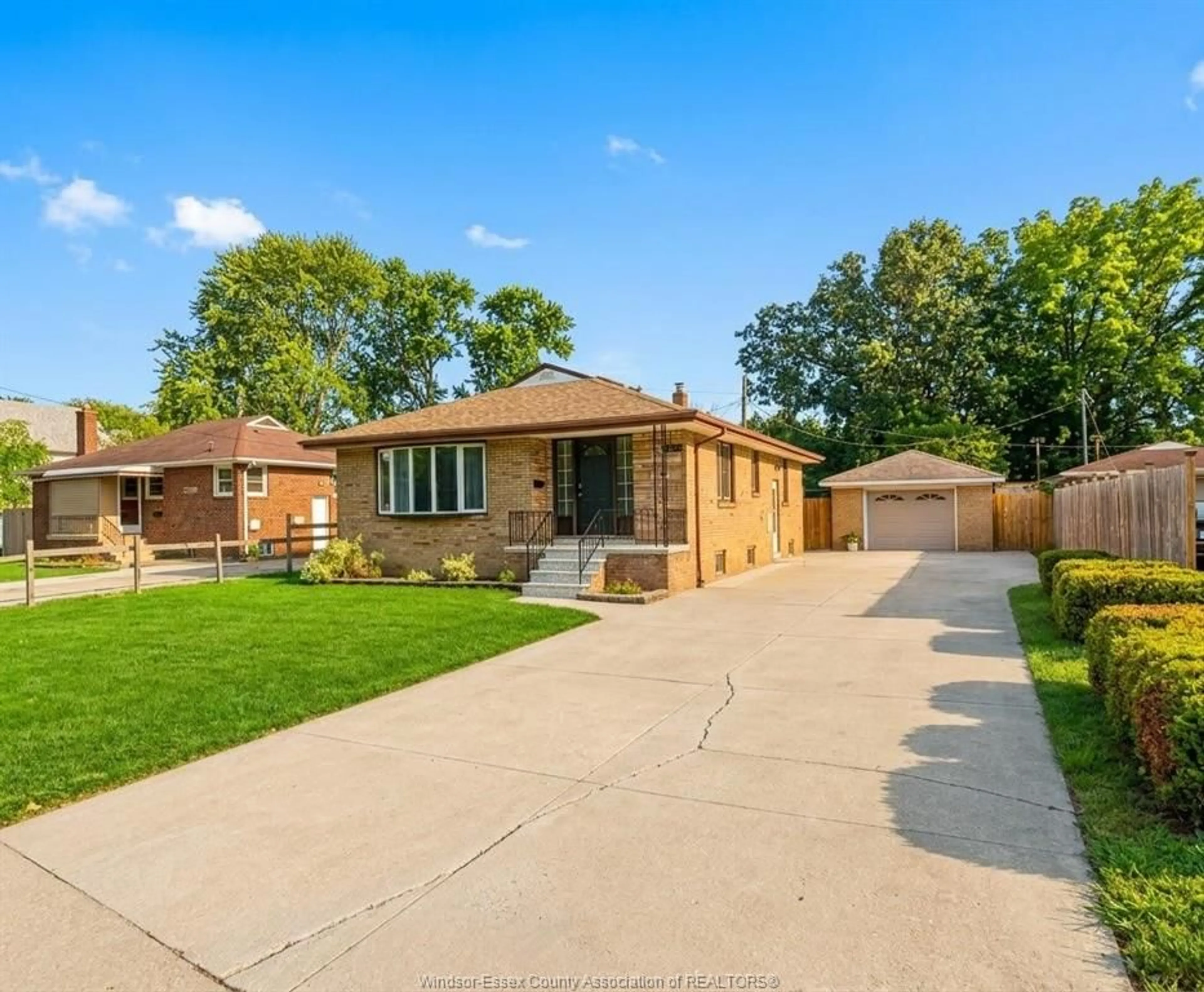 Home with brick exterior material, street for 4245 WYANDOTTE St, Windsor Ontario N8Y 1G8
