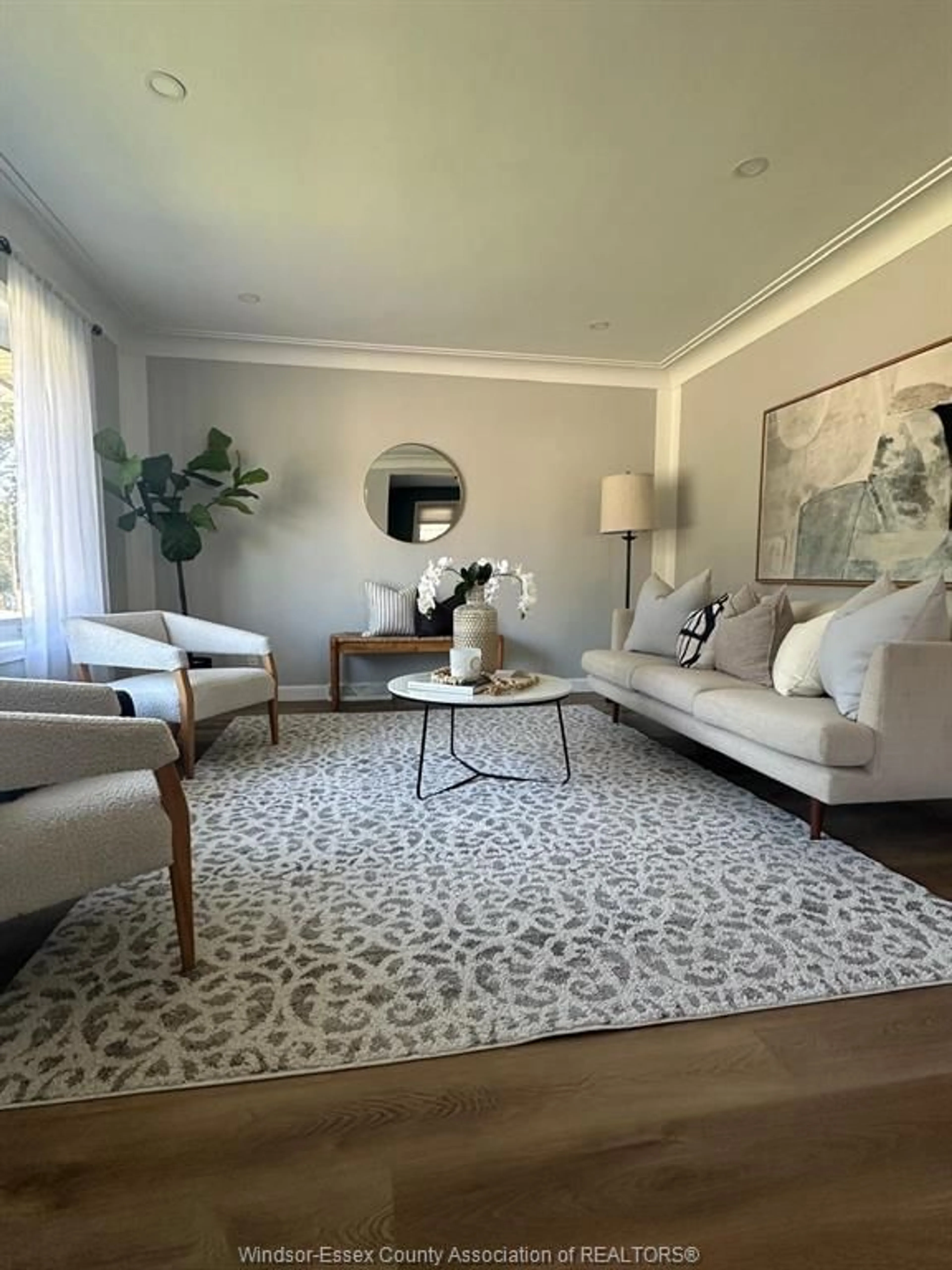 Living room with furniture, carpet floor for 4245 WYANDOTTE St, Windsor Ontario N8Y 1G8