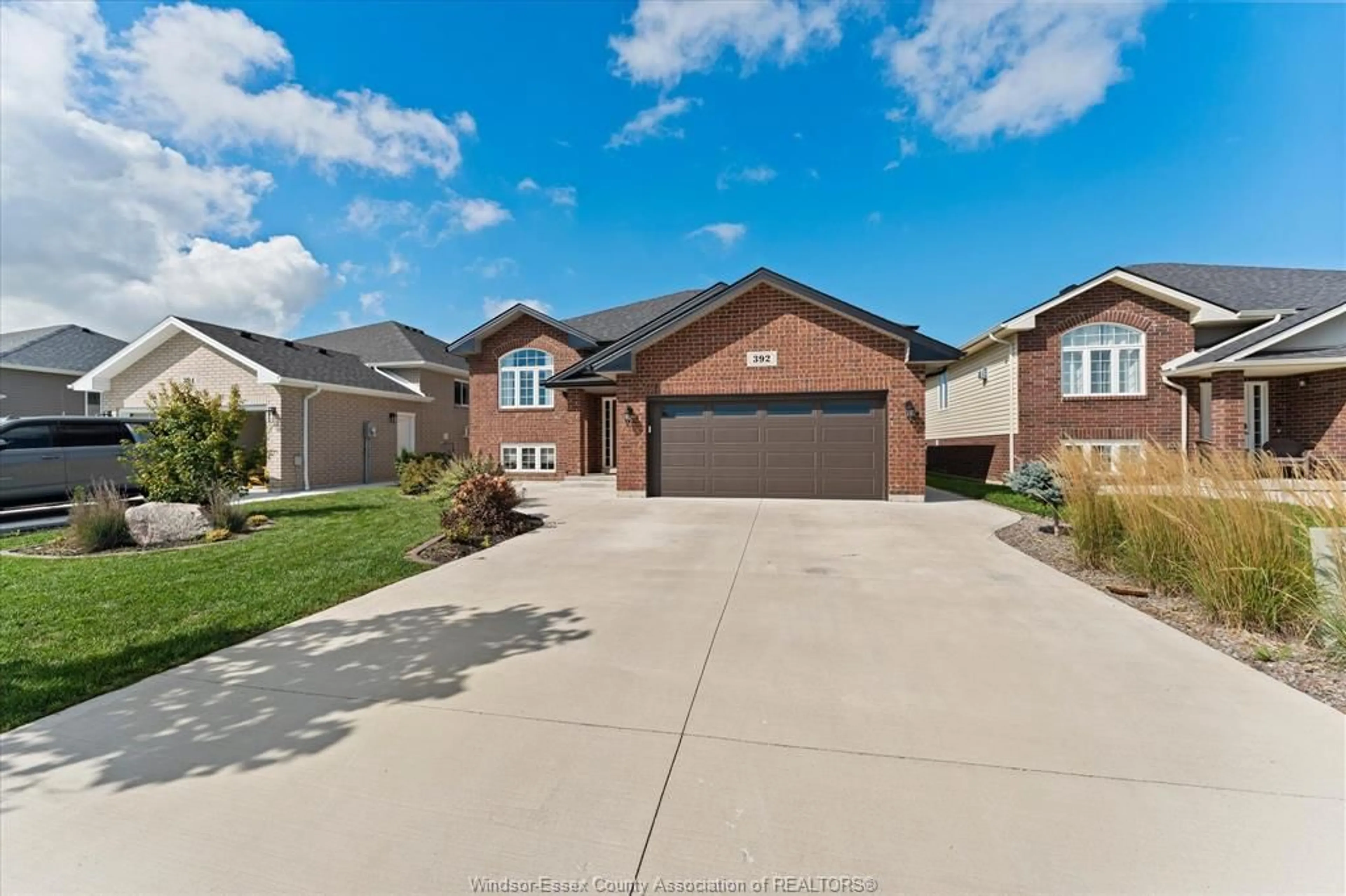 Home with brick exterior material, street for 392 CYPRESS Lane, Lakeshore Ontario N8L 1A8