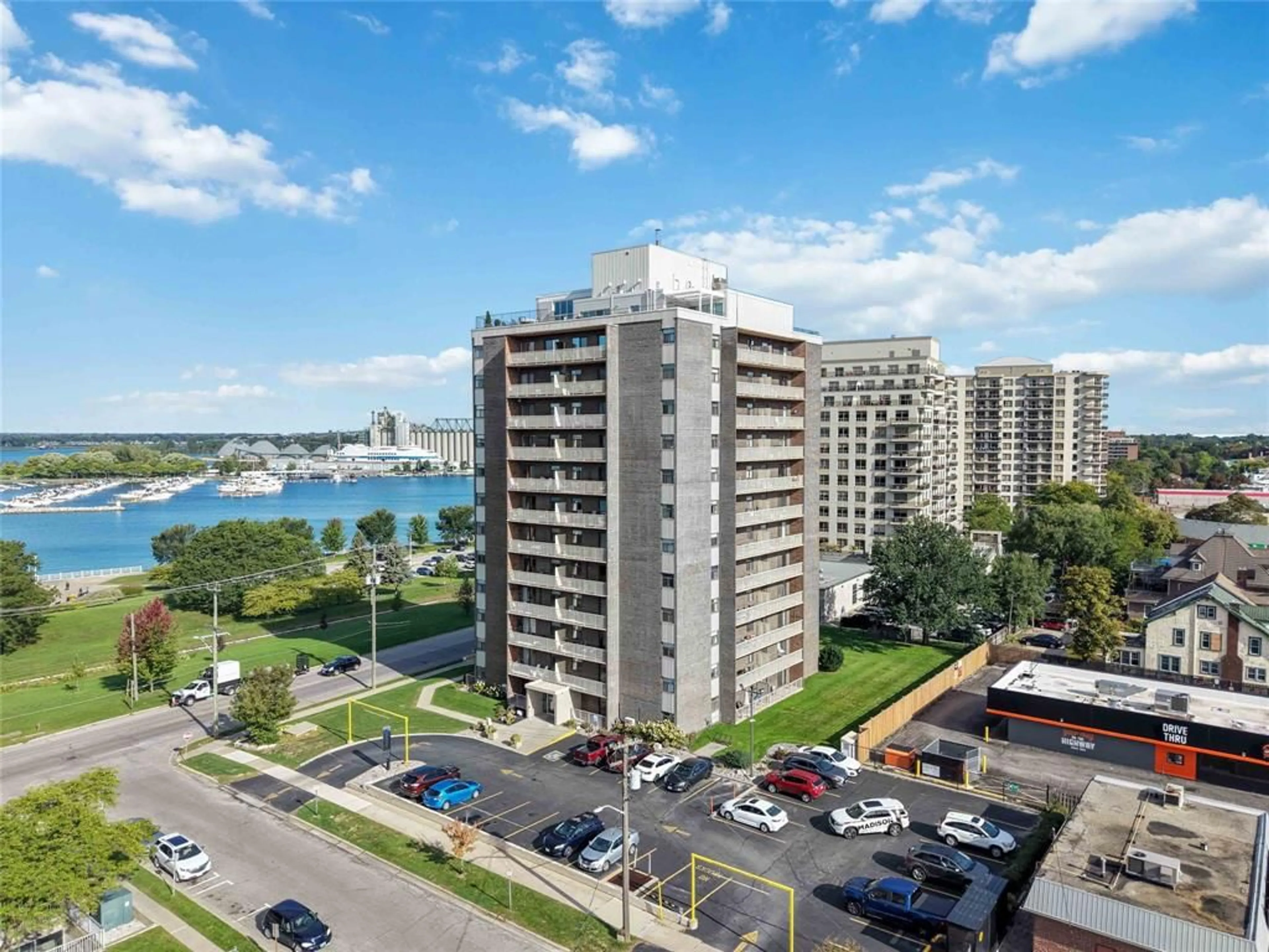 A pic from outside/outdoor area/front of a property/back of a property/a pic from drone, water/lake/river/ocean view for 10 Derby Lane #108, Sarnia Ontario N7T 4S4