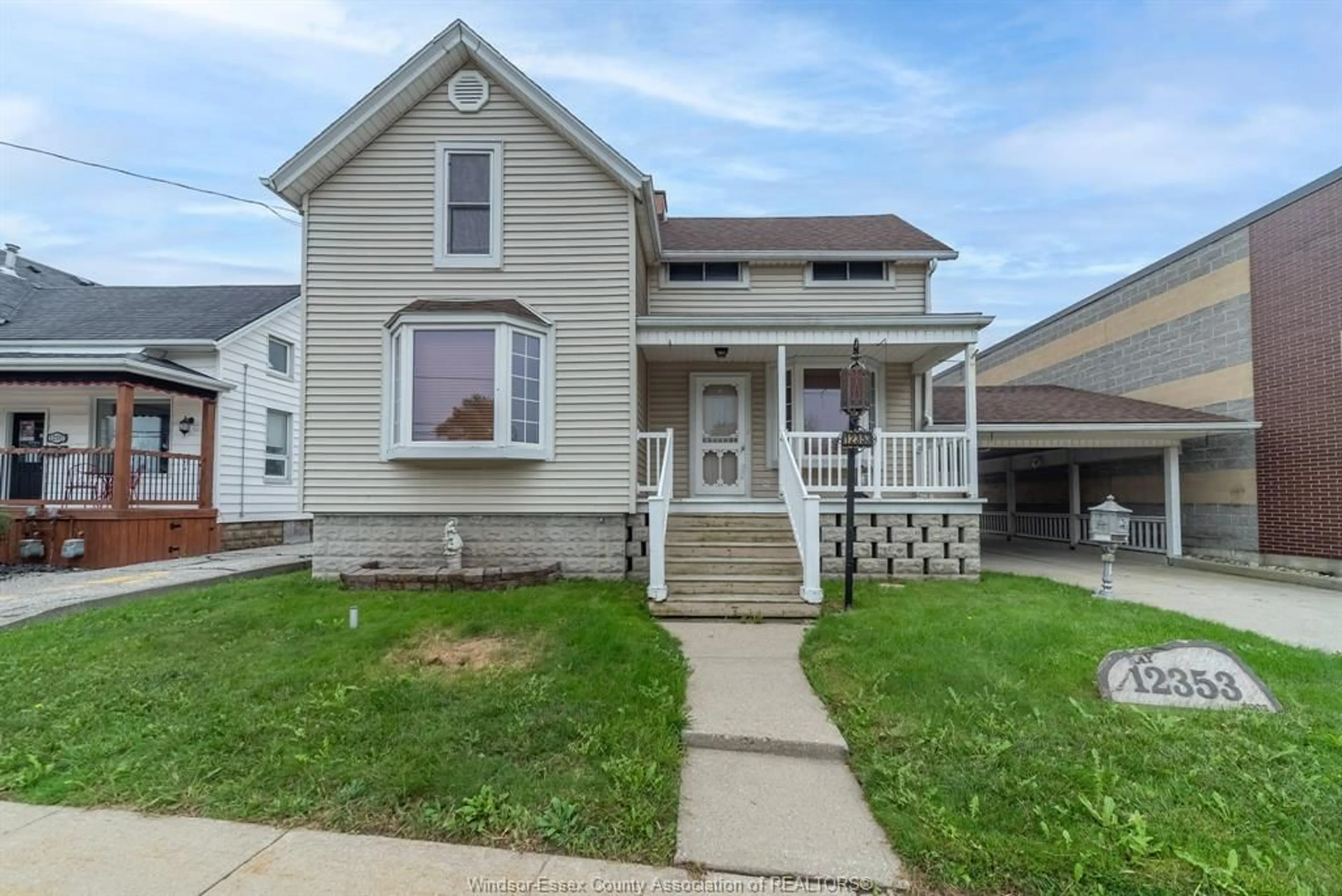 Home with vinyl exterior material, street for 12353 TECUMSEH Rd, Tecumseh Ontario N8N 1M5