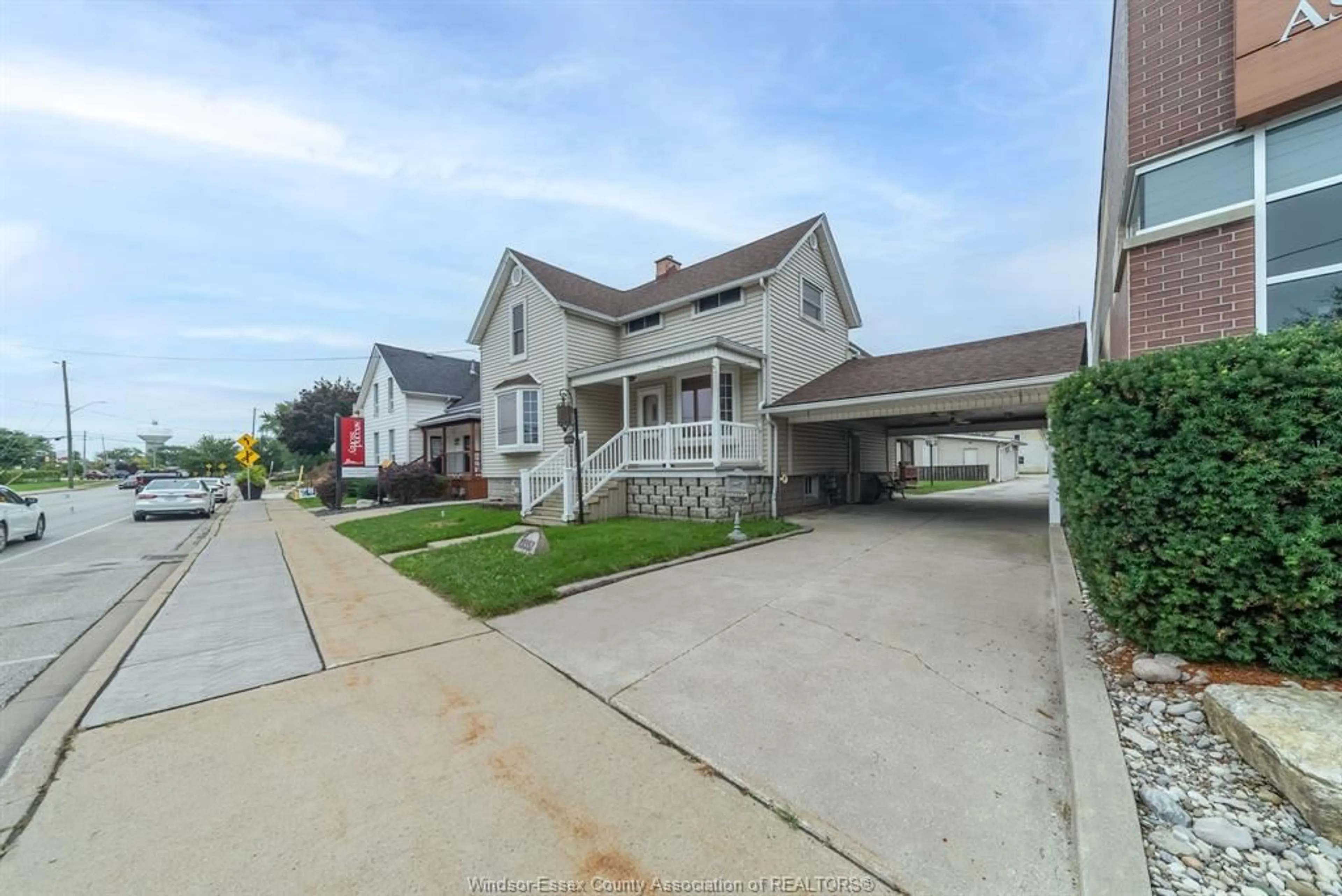 A pic from outside/outdoor area/front of a property/back of a property/a pic from drone, street for 12353 TECUMSEH Rd, Tecumseh Ontario N8N 1M5