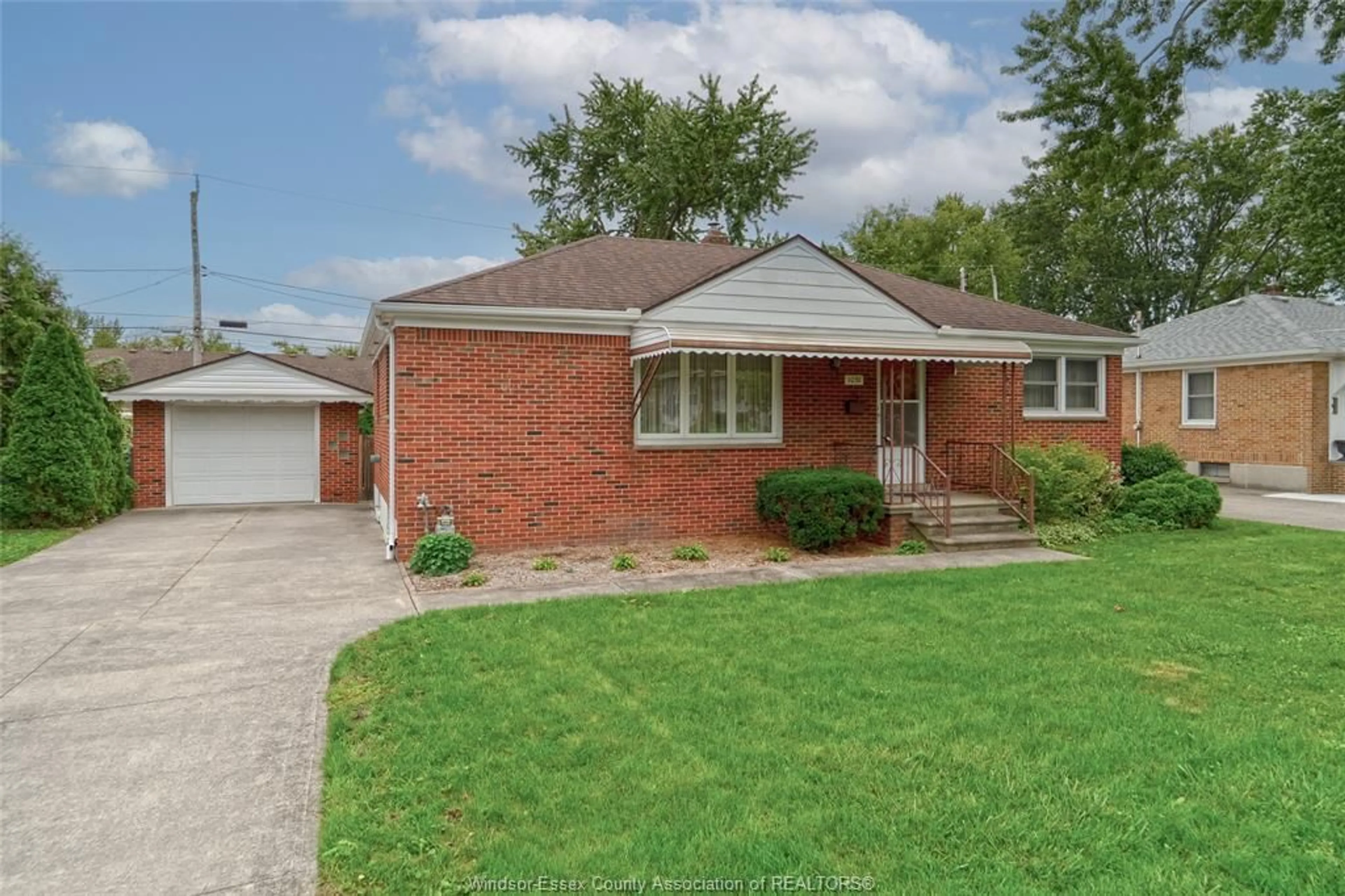 Home with brick exterior material, street for 1051 Grand Marais Rd, Windsor Ontario N9E 1C2