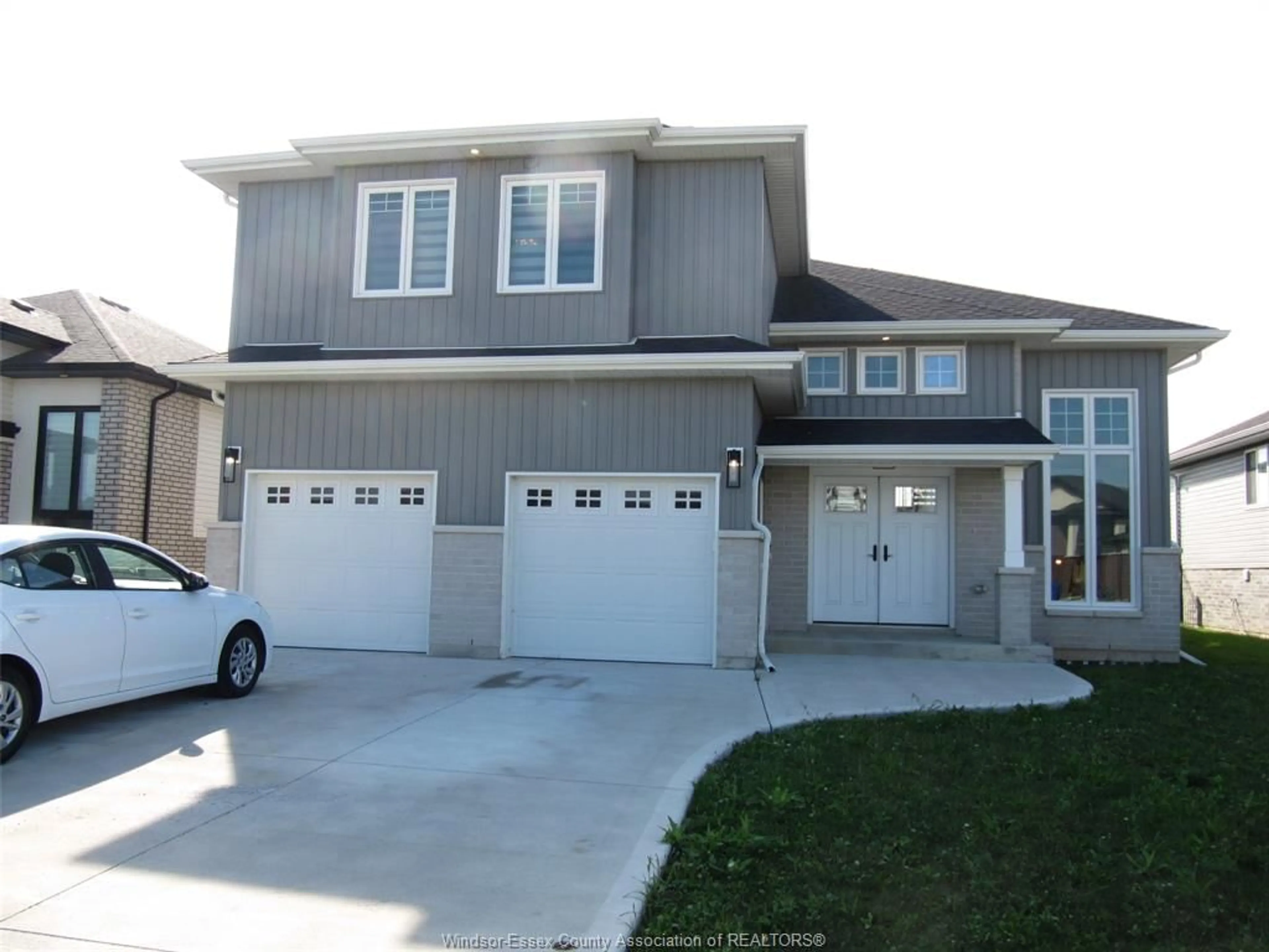 Home with vinyl exterior material, street for 305 Morin Road, Amherstburg Ontario N9V 4B5