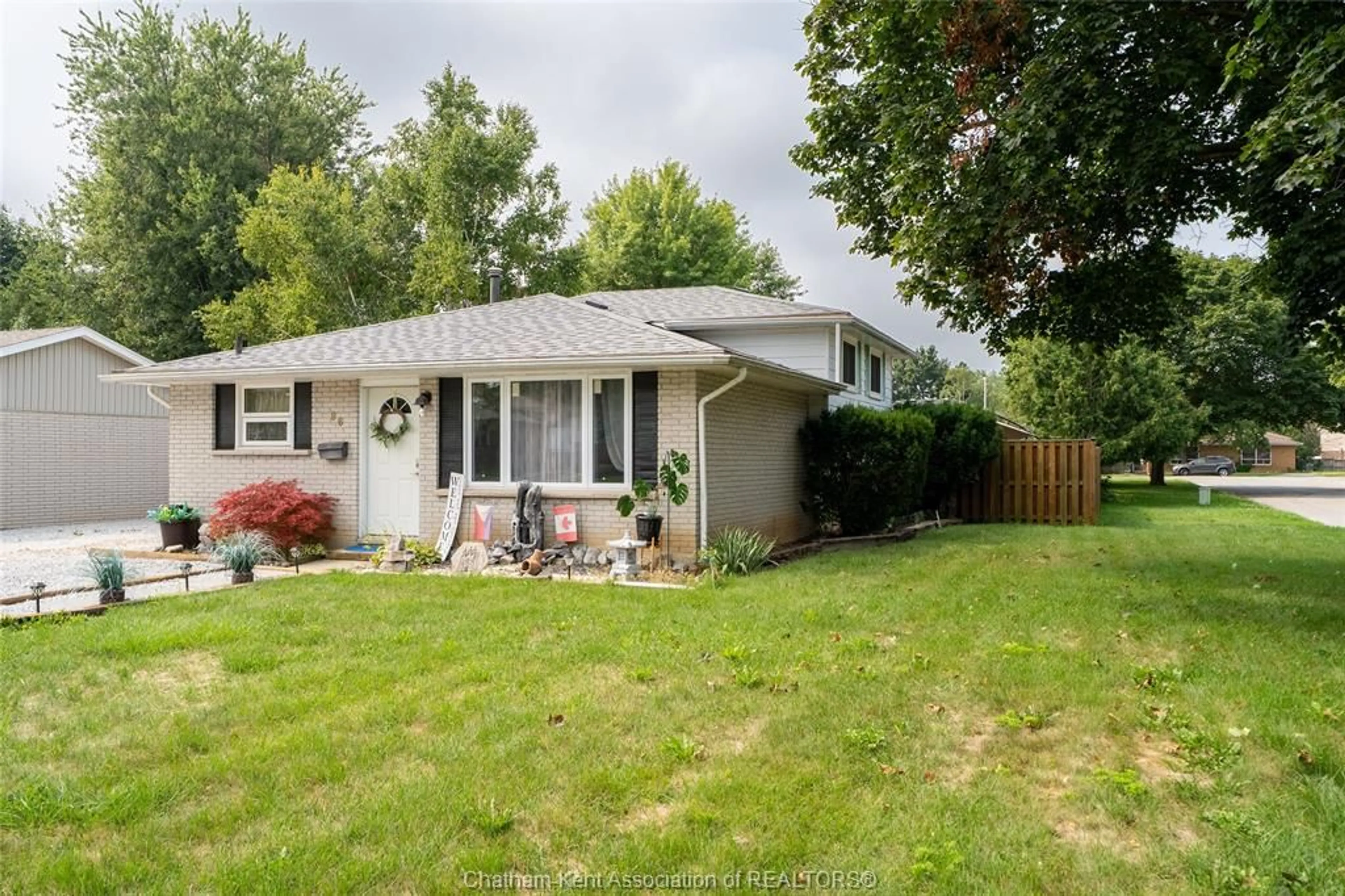 Home with vinyl exterior material, street for 86 Marion Ave, Chatham Ontario N7M 5N3