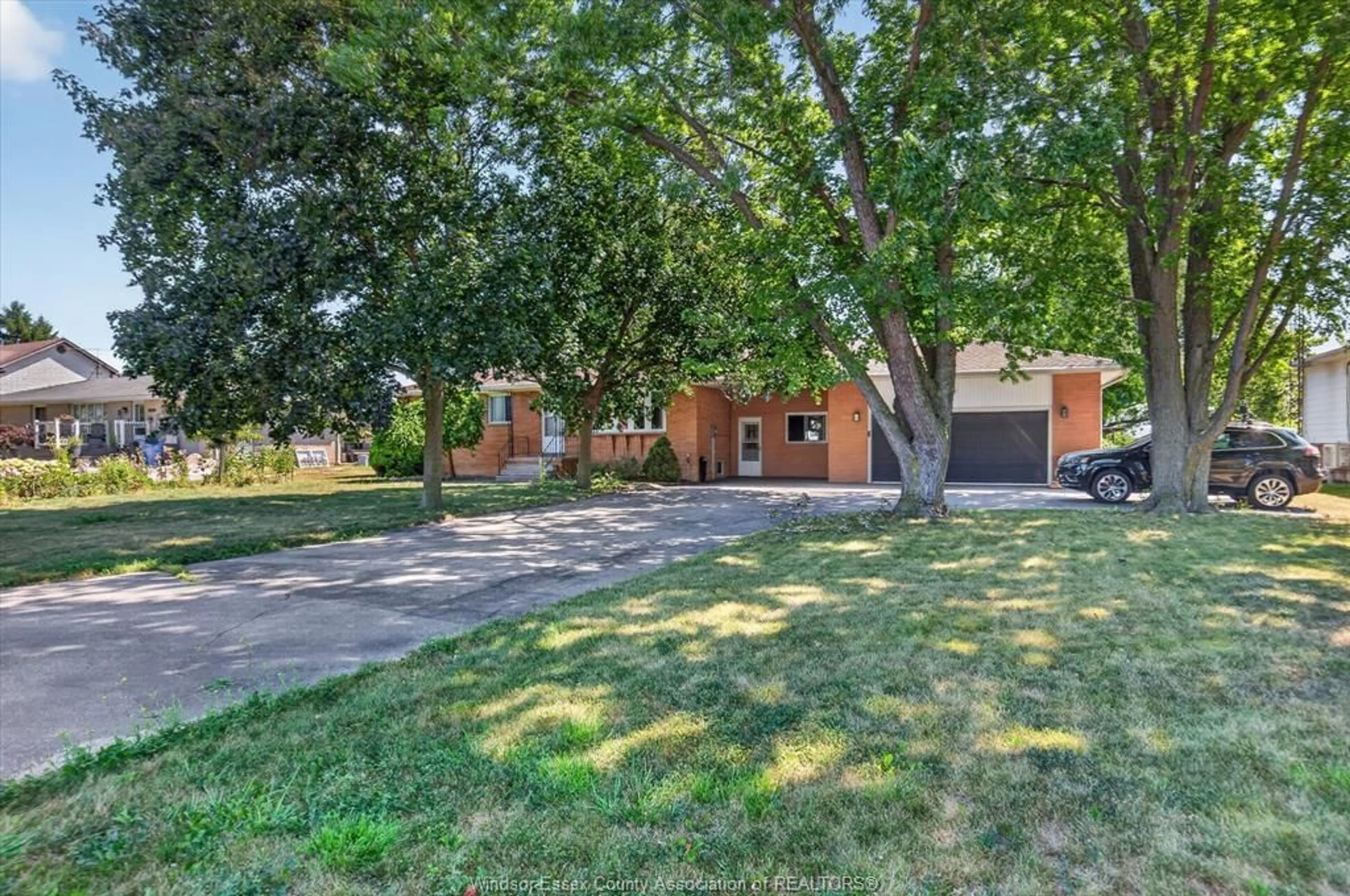 A pic from outside/outdoor area/front of a property/back of a property/a pic from drone, street for 1308 COUNTY RD 27, Lakeshore Ontario N0R 1A0
