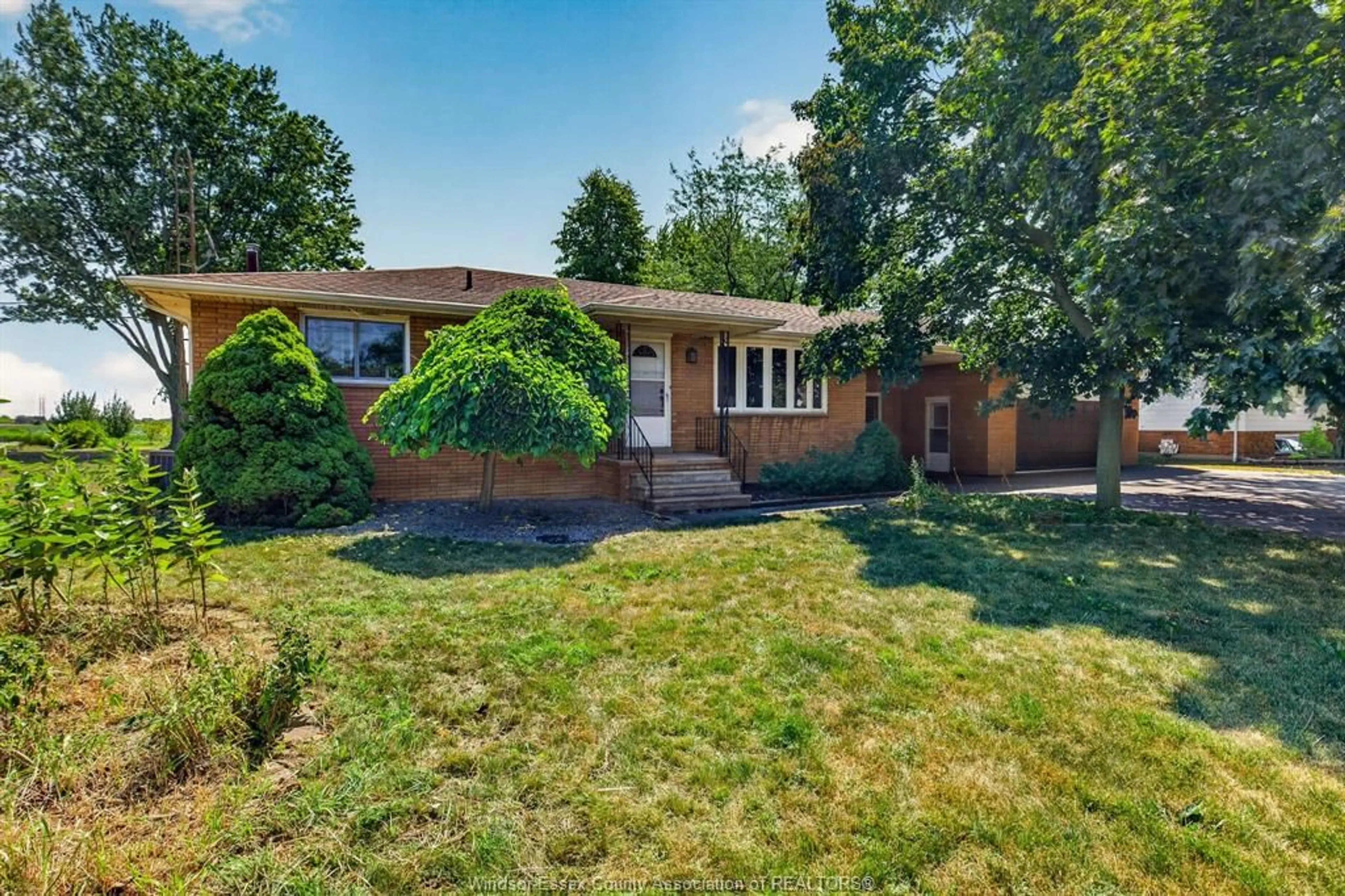 Home with brick exterior material, street for 1308 COUNTY RD 27, Lakeshore Ontario N0R 1A0