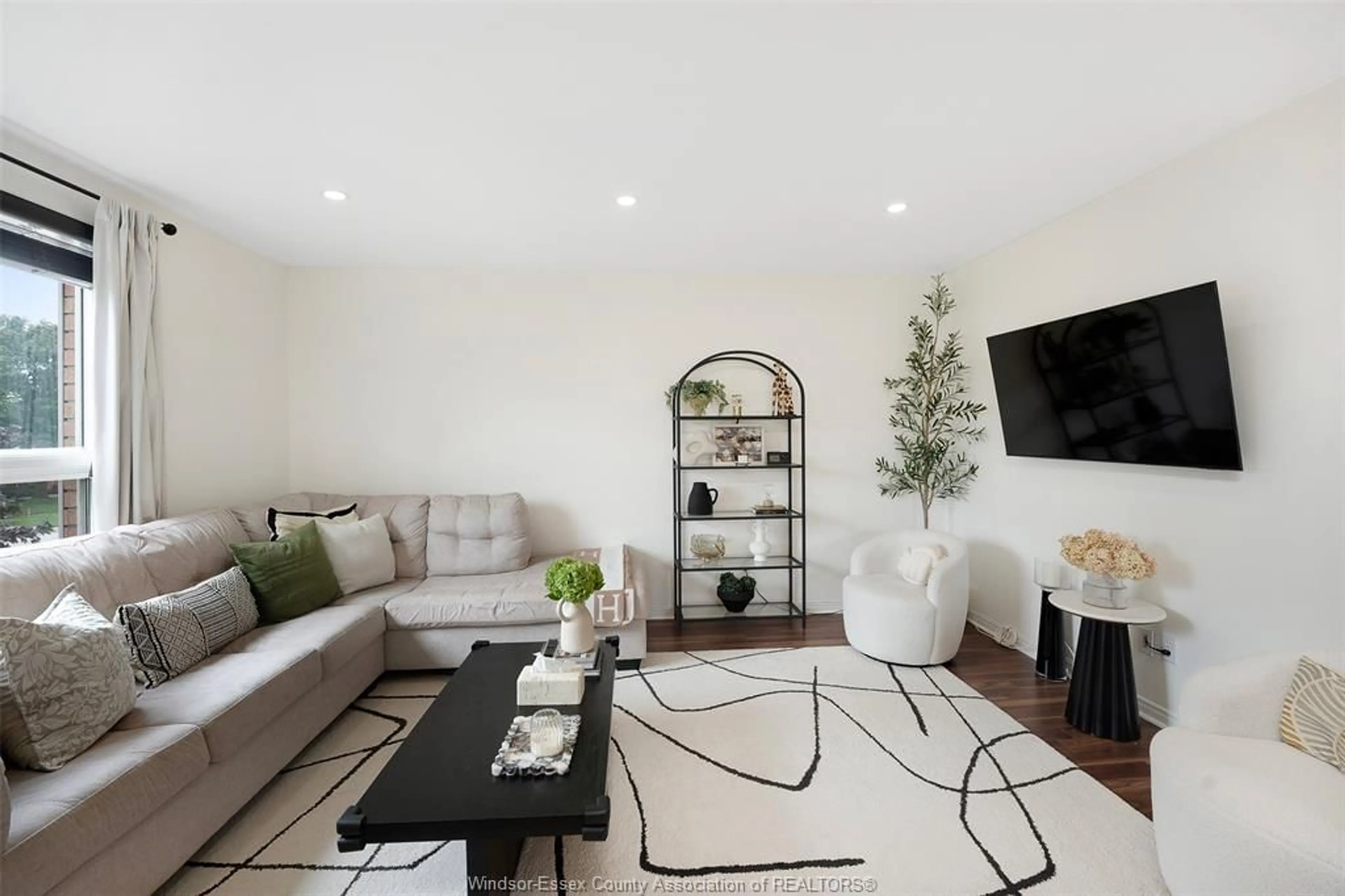 Living room with furniture, ceramic/tile floor for 12589 HORWOOD Cres, Tecumseh Ontario N8N 4T7