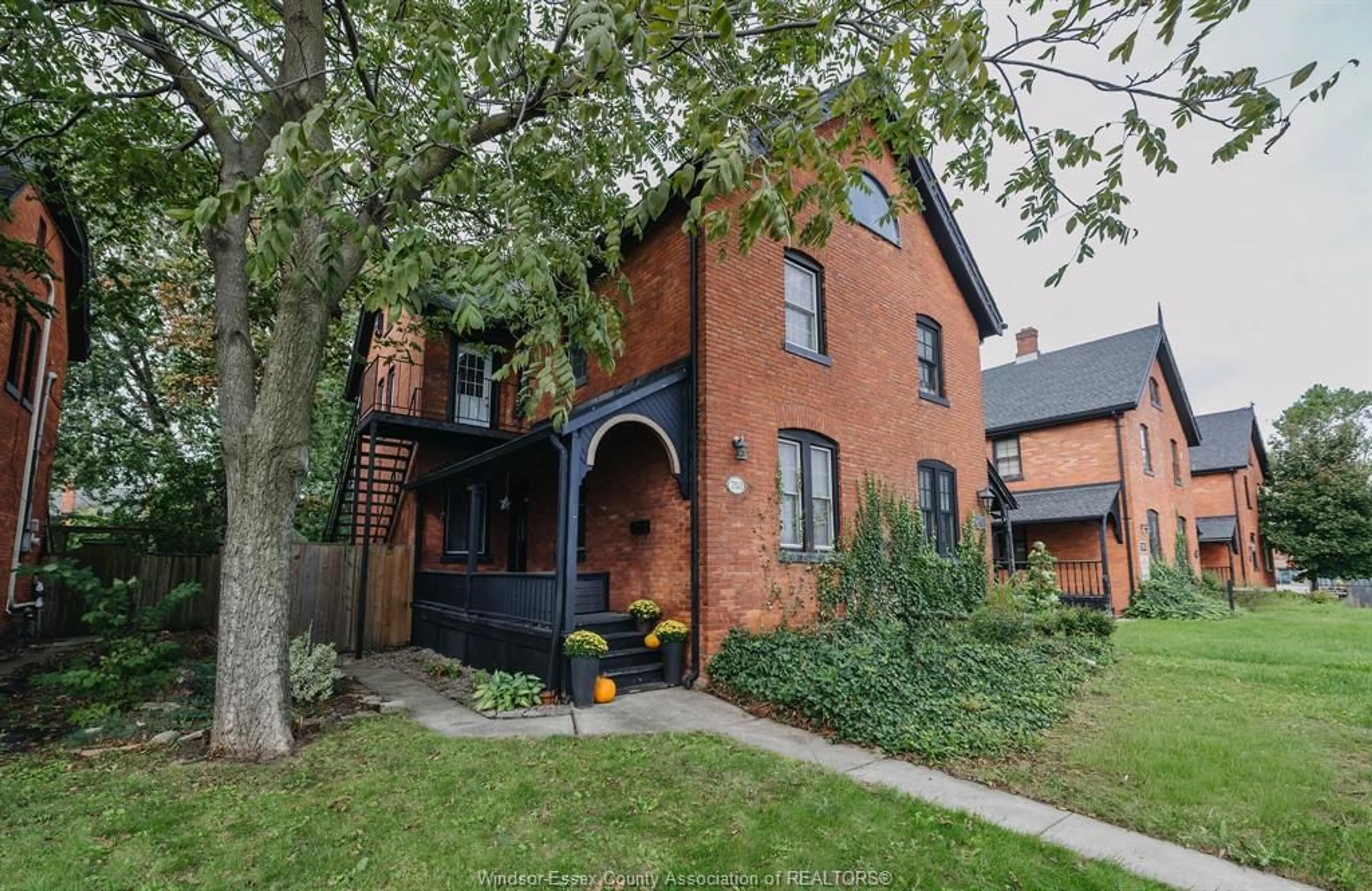 Home with brick exterior material, street for 753 Walker Rd, Windsor Ontario N8Y 2N2