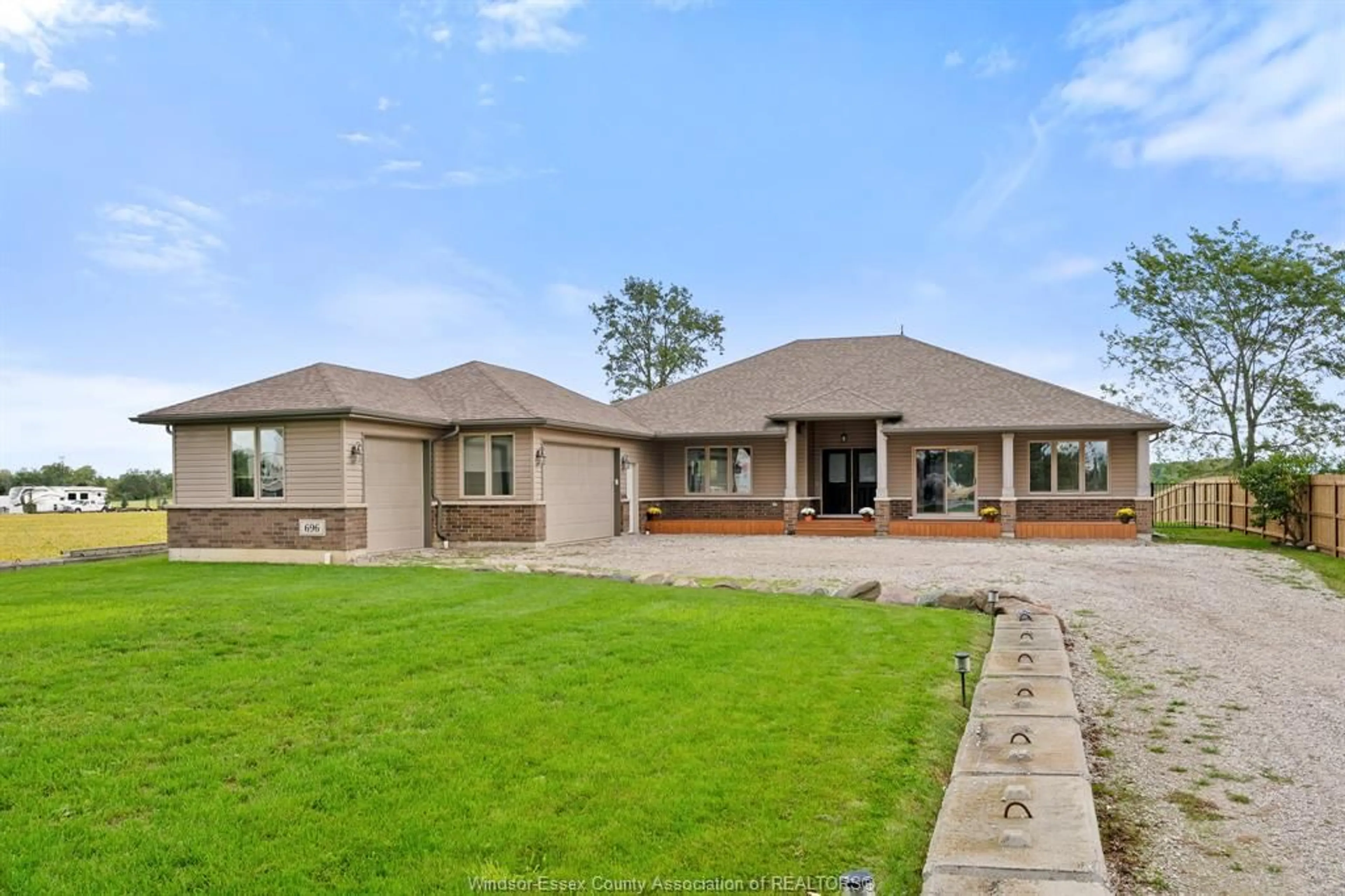 Home with brick exterior material, street for 696 PUCE Rd, Lakeshore Ontario N8M 2X7