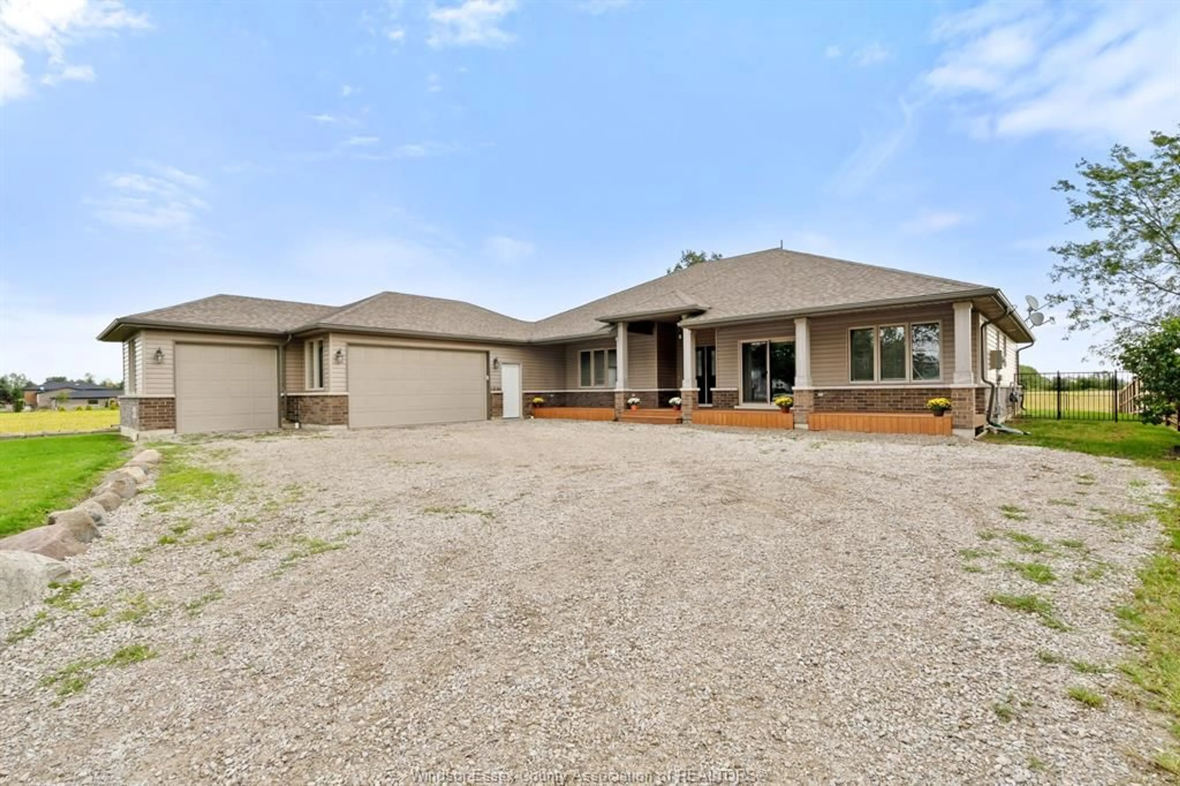 A pic from outside/outdoor area/front of a property/back of a property/a pic from drone, street for 696 PUCE Rd, Lakeshore Ontario N8M 2X7