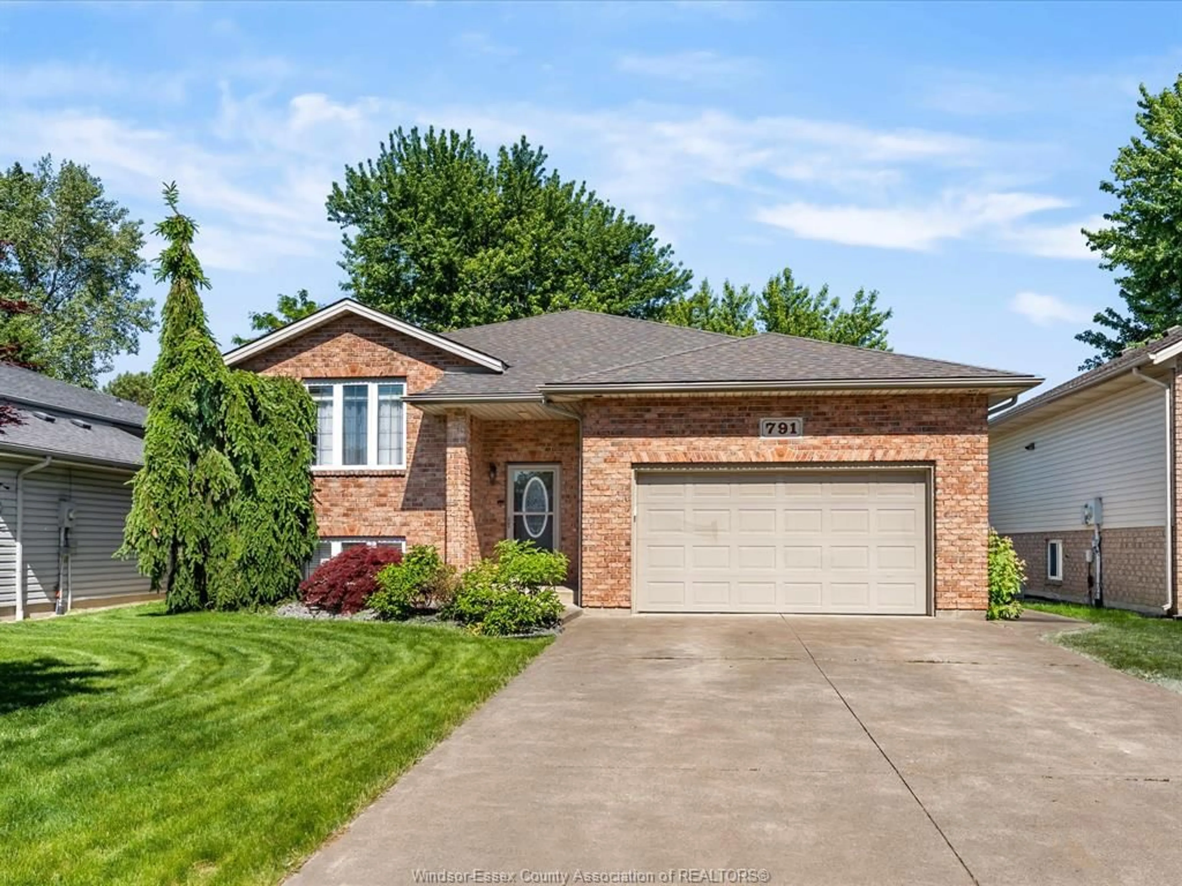 Home with brick exterior material, street for 791 HELENA Cres, Belle River Ontario N8L 0L1