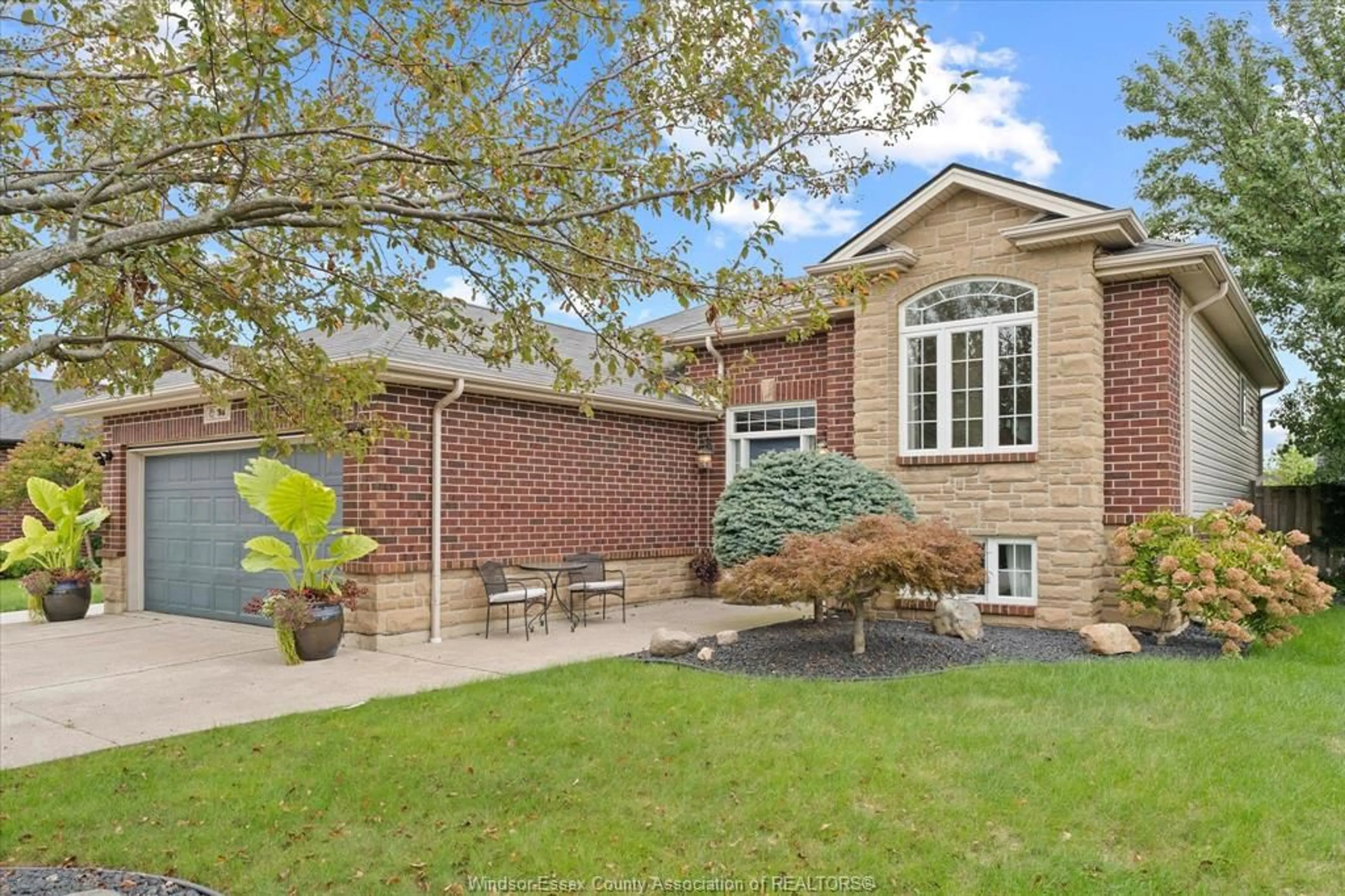 Home with brick exterior material, street for 98 HAZEL Cres, Kingsville Ontario N9Y 0B2
