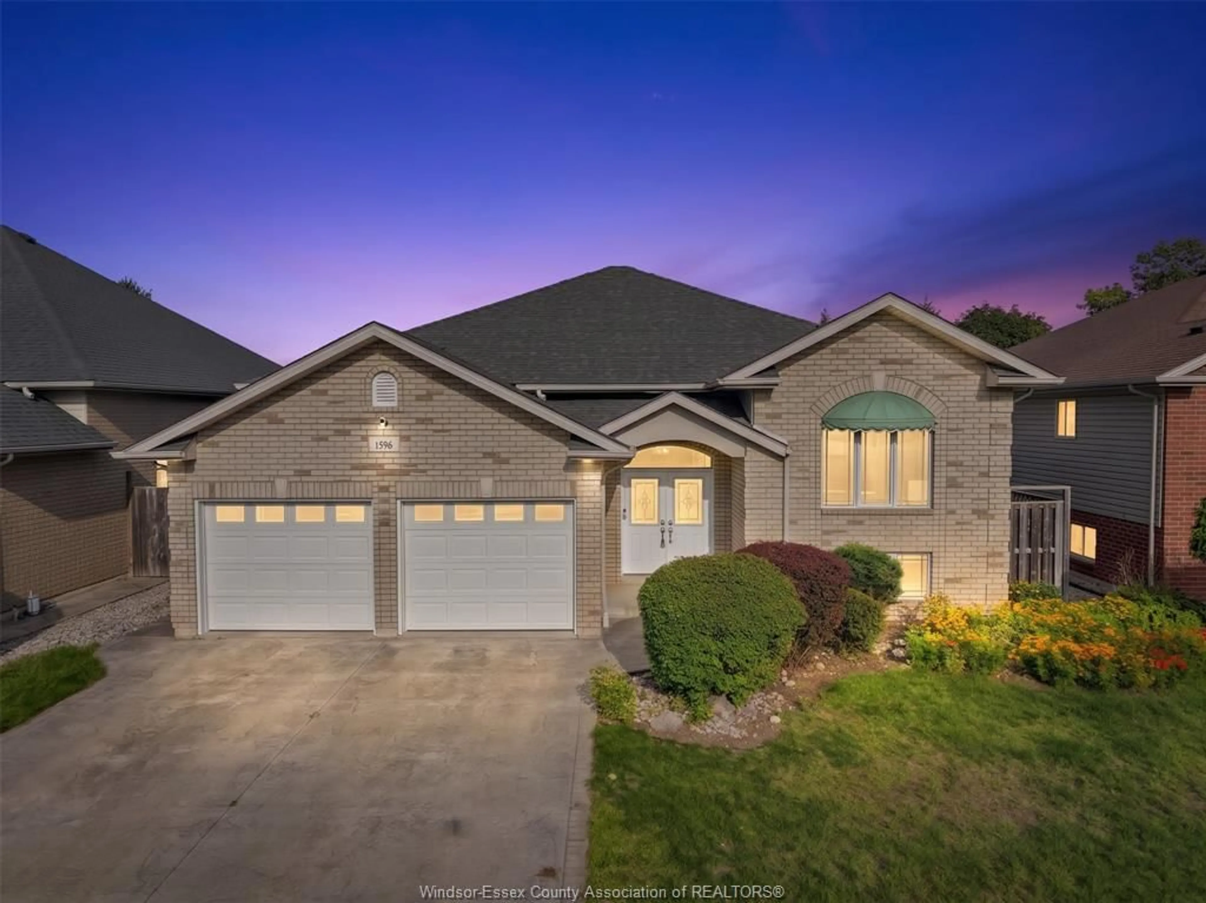 Home with brick exterior material, street for 1596 MORNINGSTAR Ave, Windsor Ontario N8P 1P9