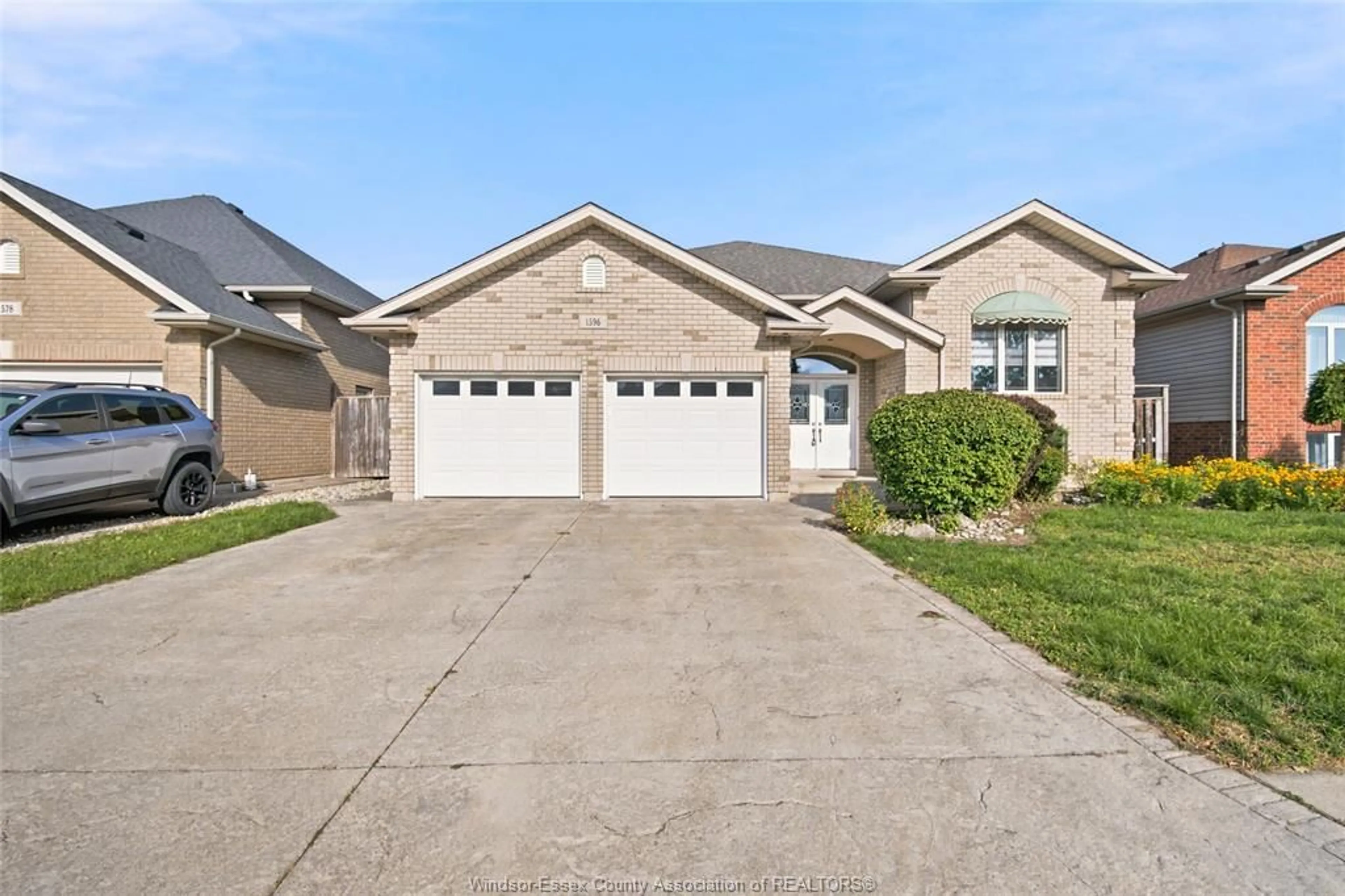 Home with brick exterior material, street for 1596 MORNINGSTAR Ave, Windsor Ontario N8P 1P9