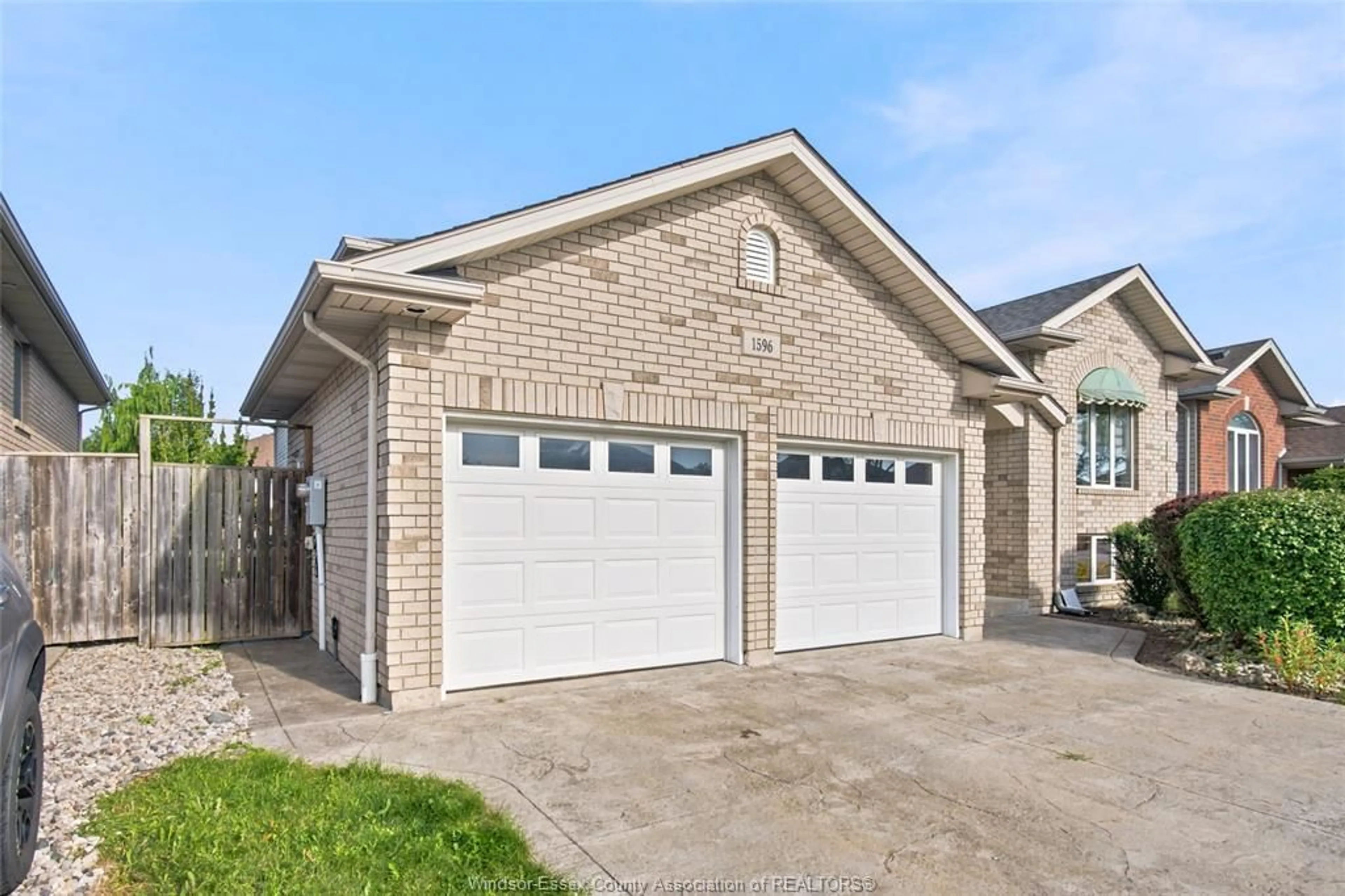 Home with brick exterior material, street for 1596 MORNINGSTAR Ave, Windsor Ontario N8P 1P9