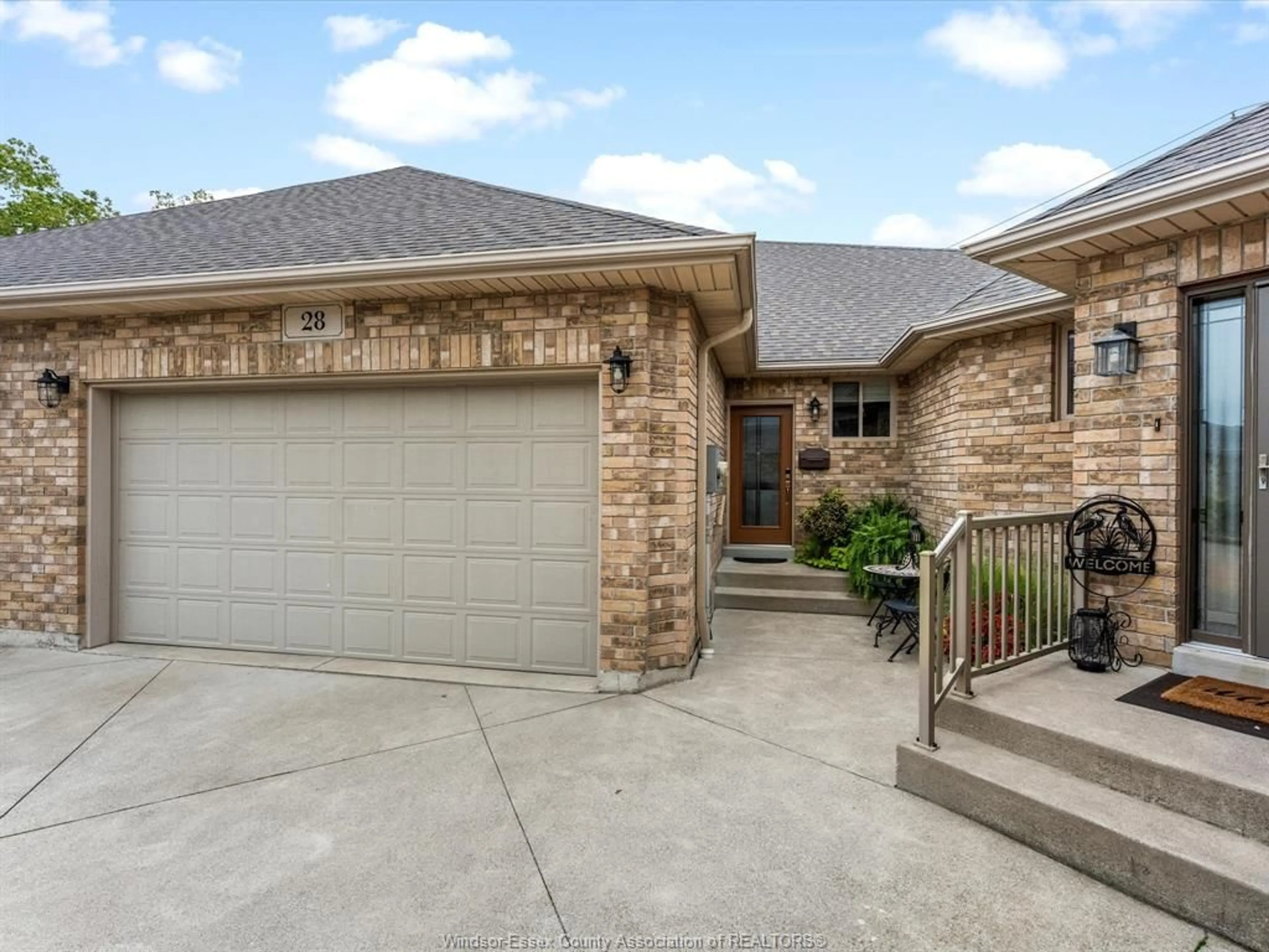 Home with brick exterior material, unknown for 28 Mettawas Lane, Kingsville Ontario N9Y 0A2