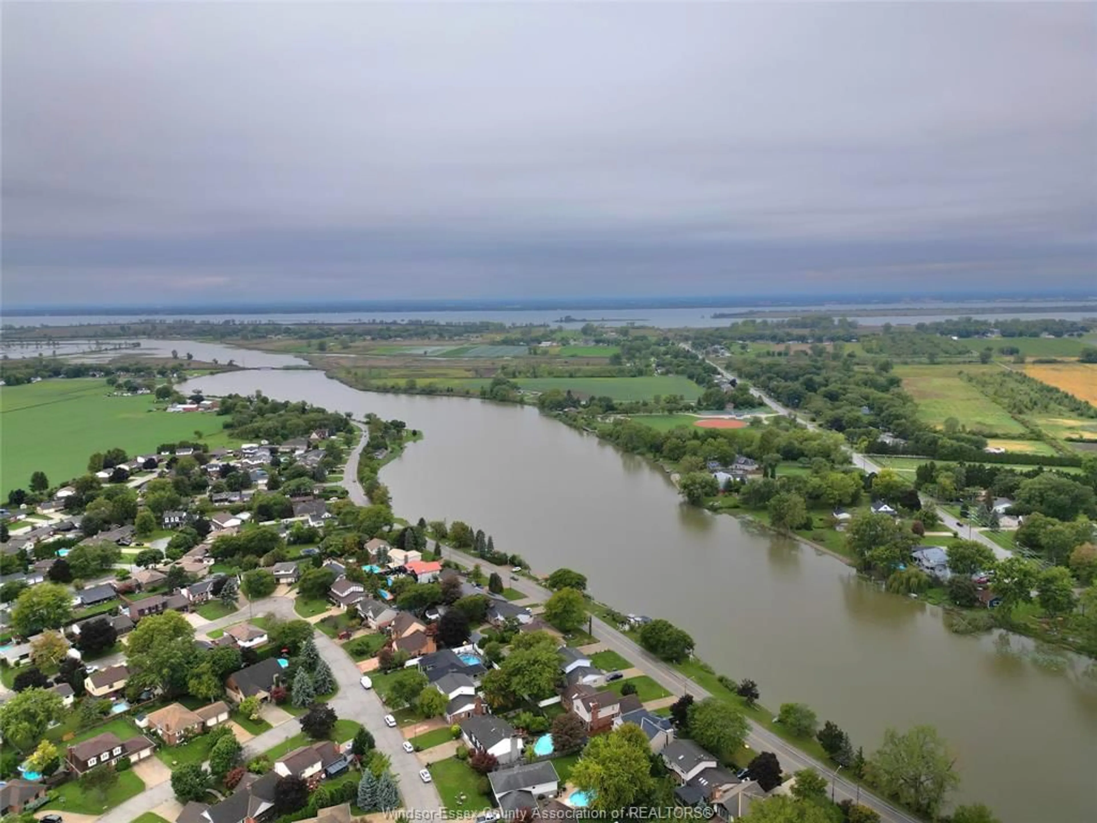 A pic from outside/outdoor area/front of a property/back of a property/a pic from drone, water/lake/river/ocean view for 219 Hyde Park, River Canard Ontario N9V 3R3