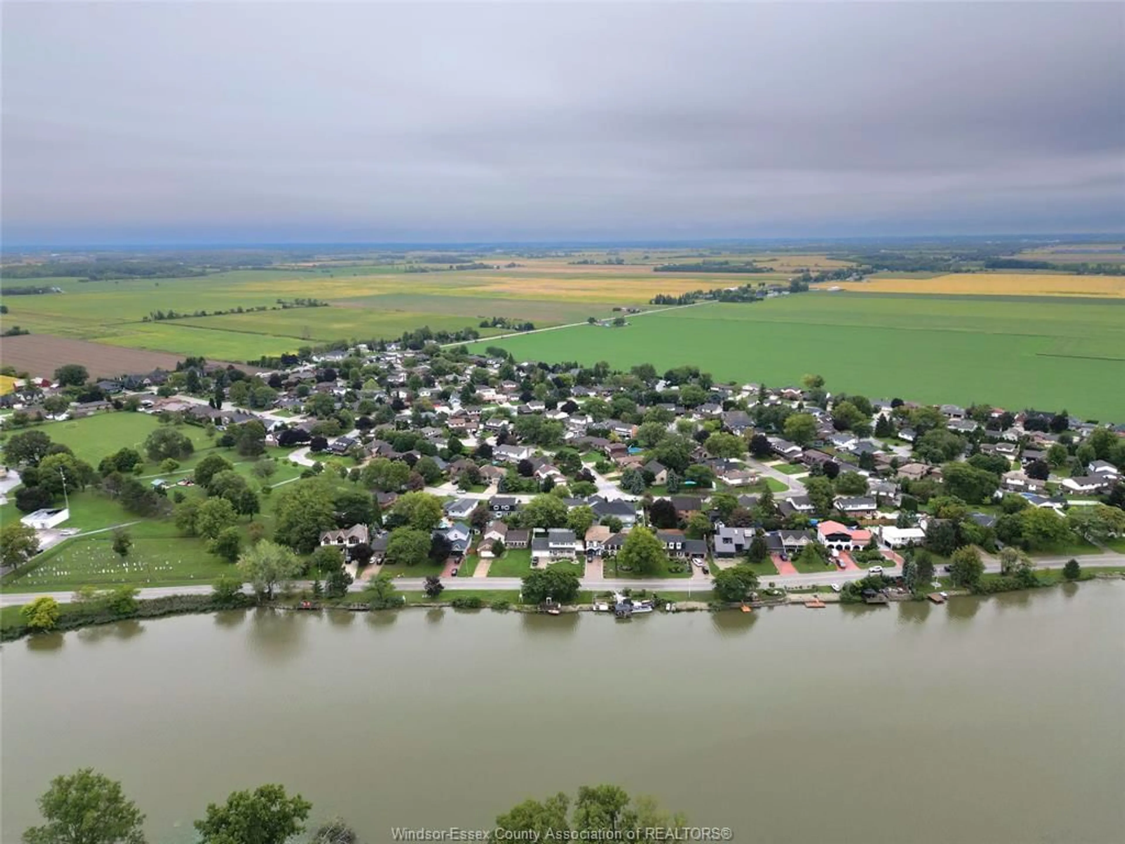 A pic from outside/outdoor area/front of a property/back of a property/a pic from drone, water/lake/river/ocean view for 219 Hyde Park, River Canard Ontario N9V 3R3