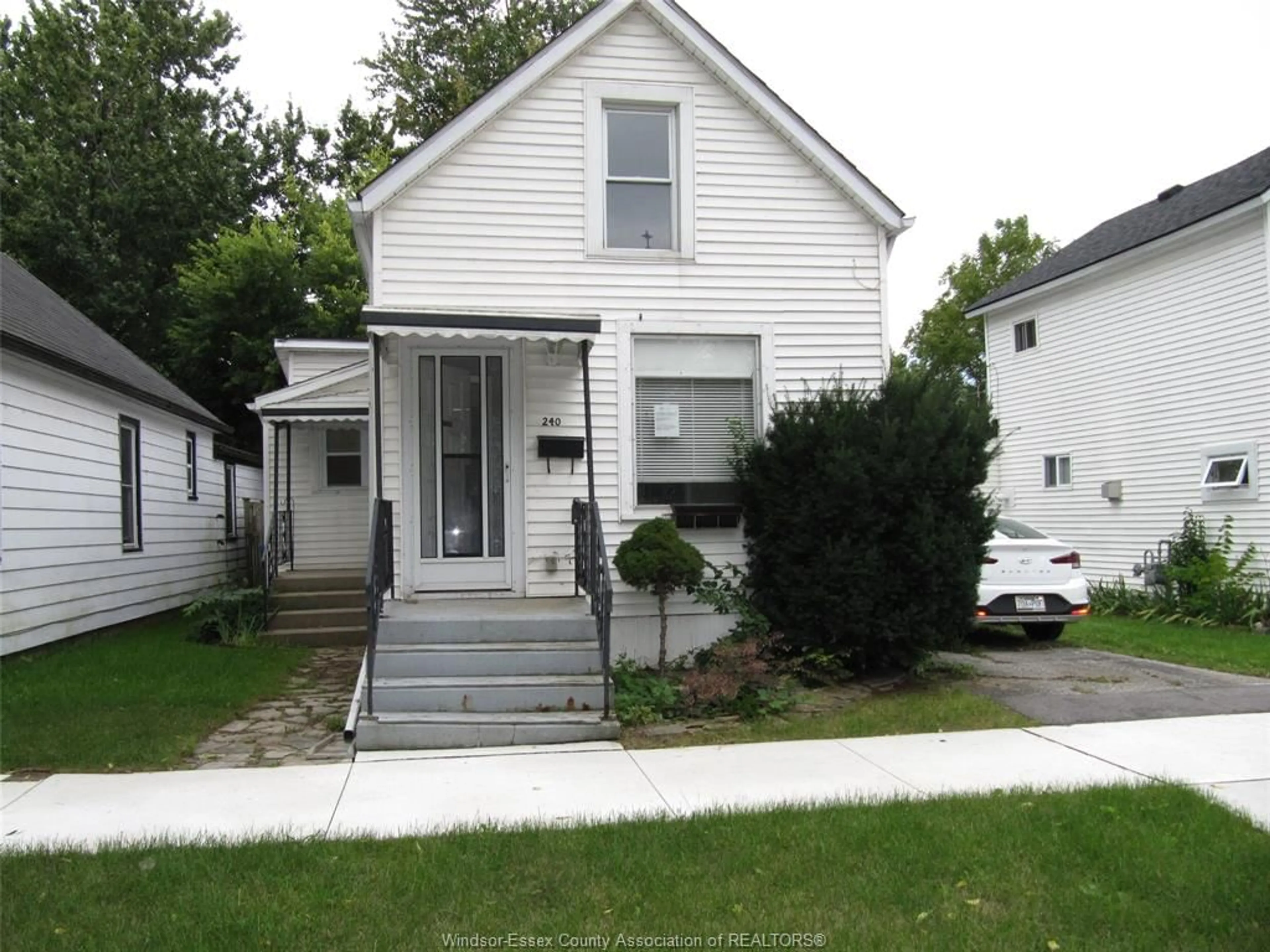 Home with vinyl exterior material, street for 240 George St, Amherstburg Ontario N9V 2E9